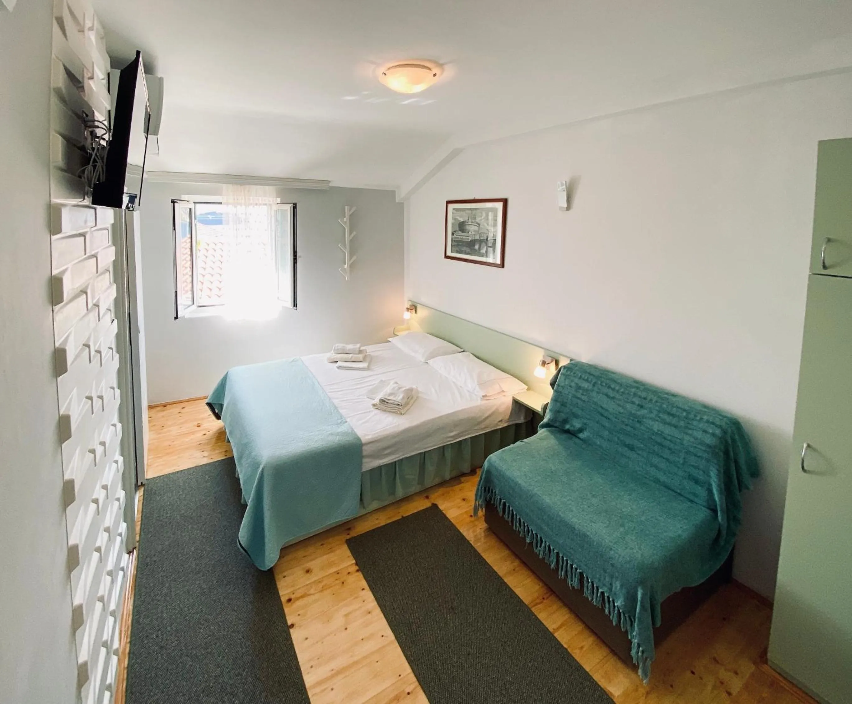 Bed in Komiza Provita Guesthouse