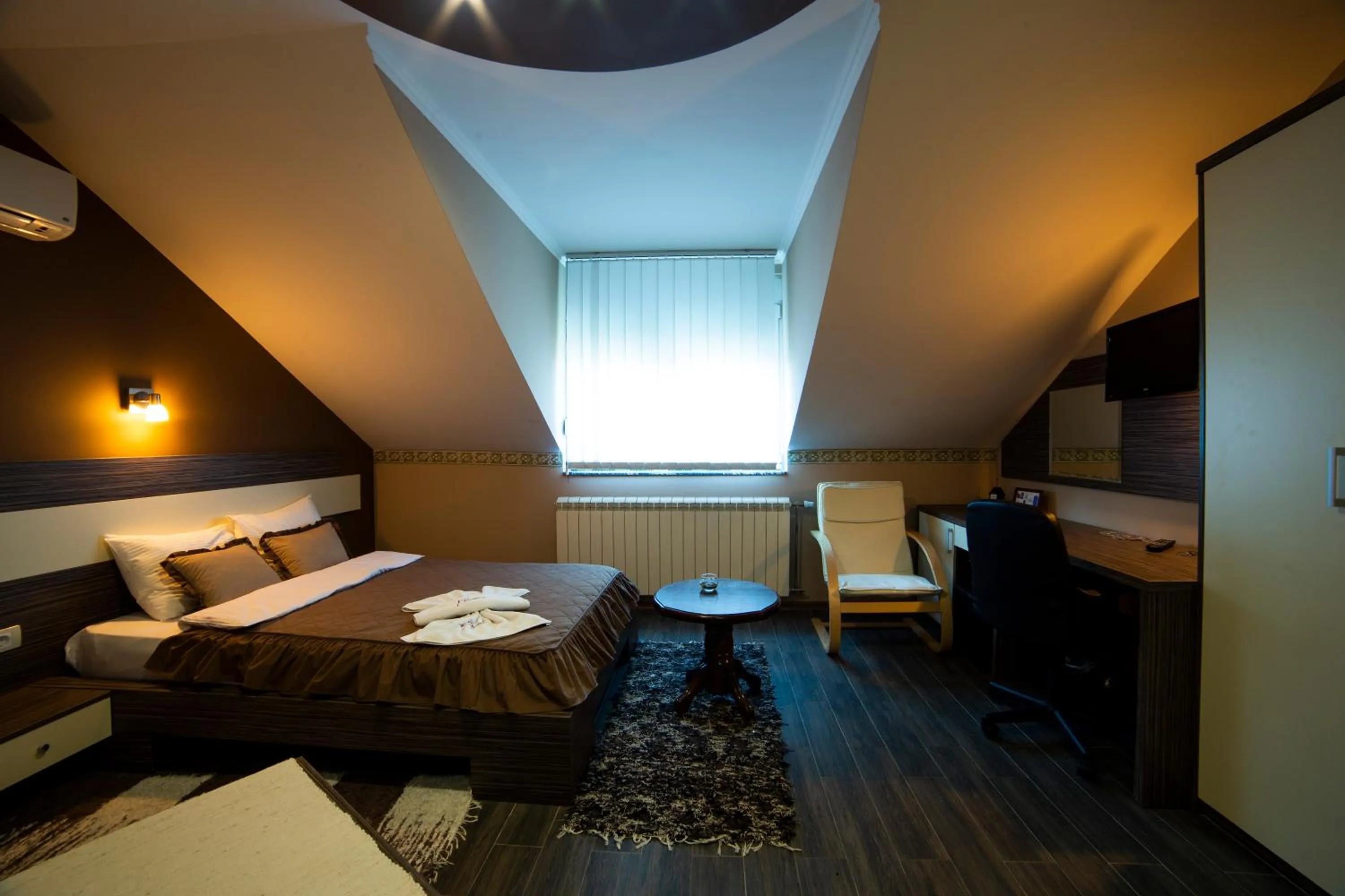 Bed in Garni Hotel Lama