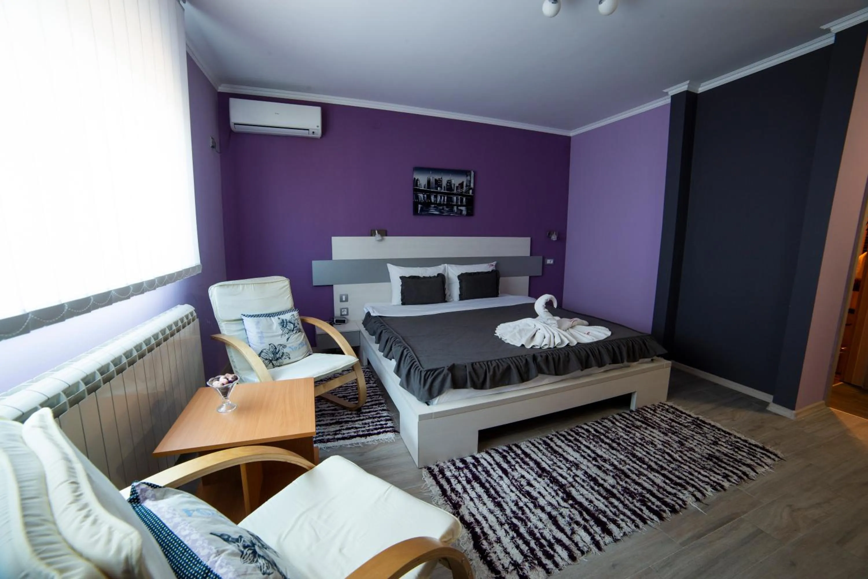 Bed in Garni Hotel Lama