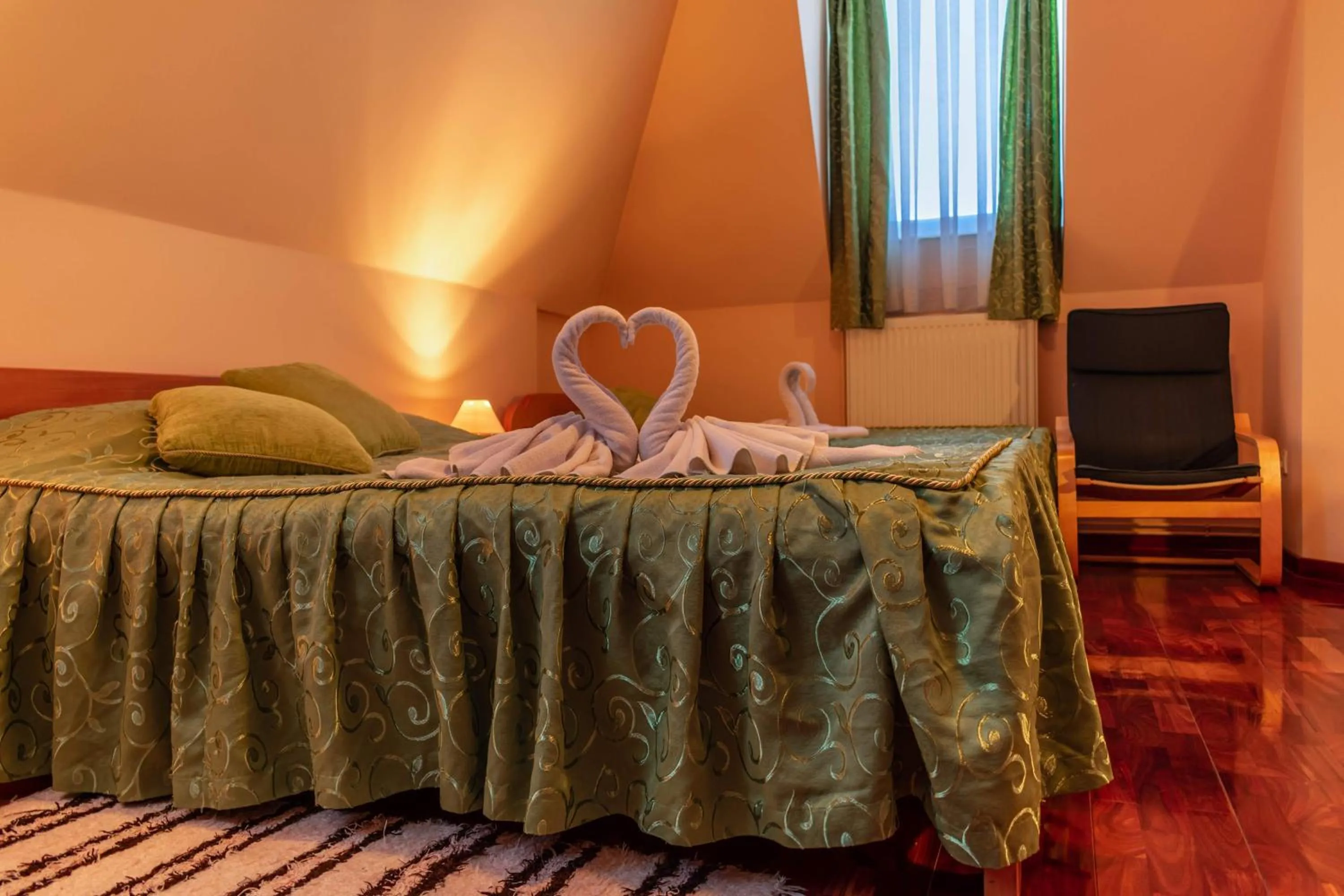 Bed in Garni Hotel Lama