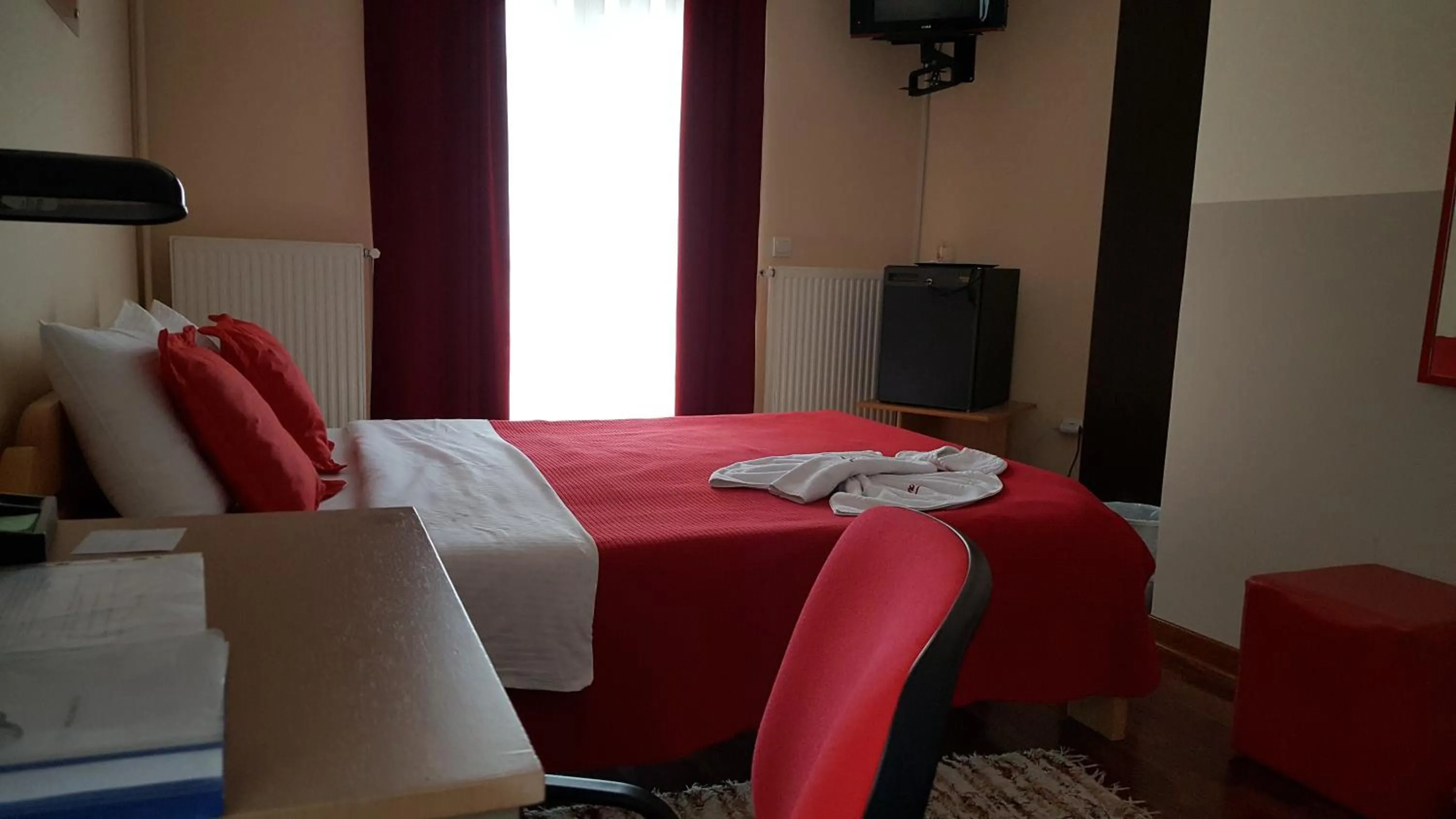 Bed in Garni Hotel Lama