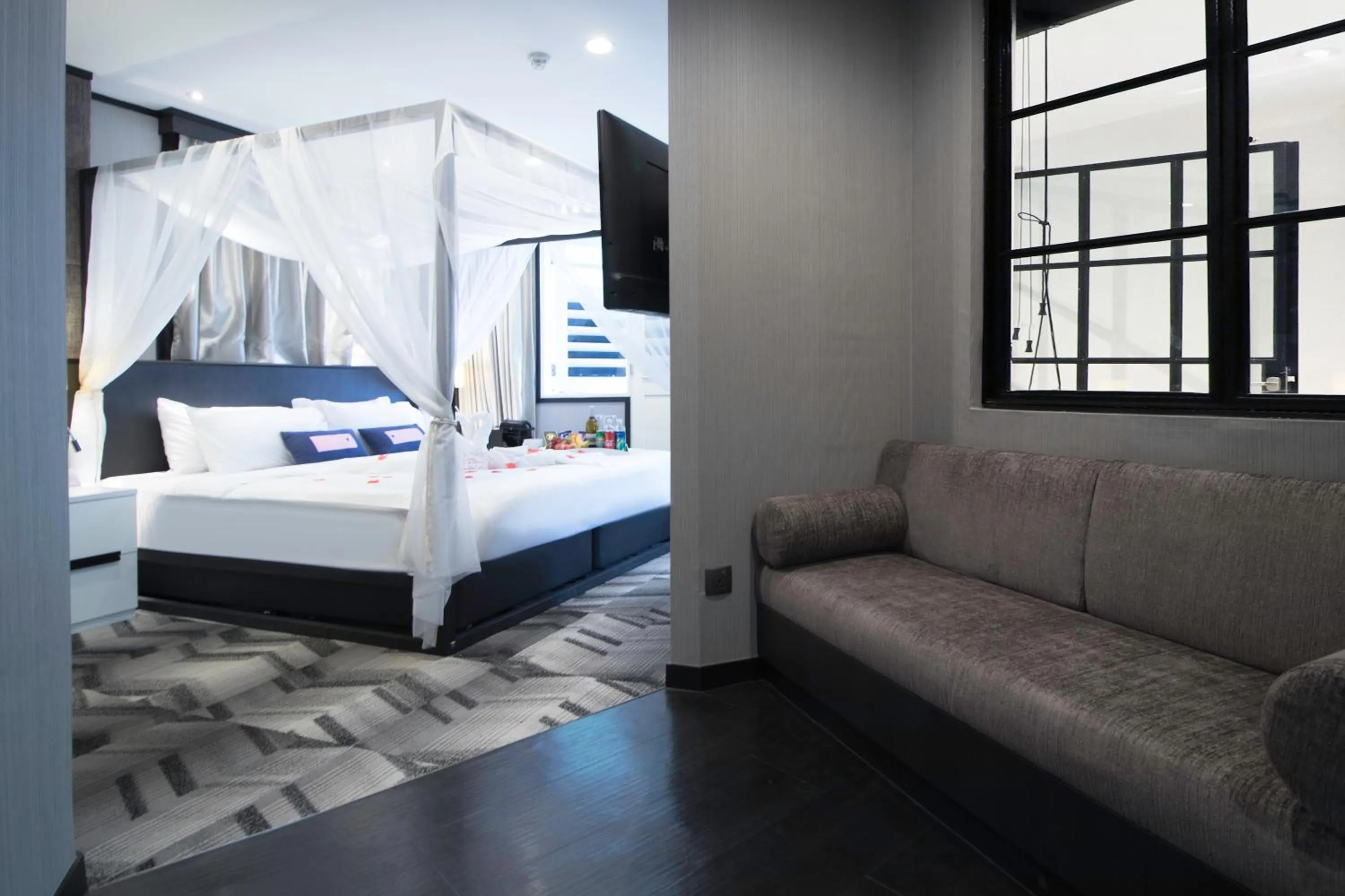 Photo of the whole room, Bed in Hotel NuVe Urbane