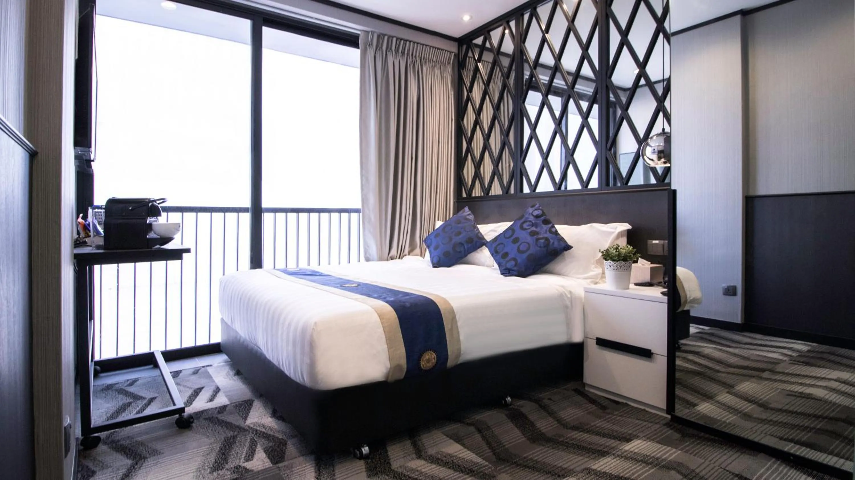 Photo of the whole room, Bed in Hotel NuVe Urbane