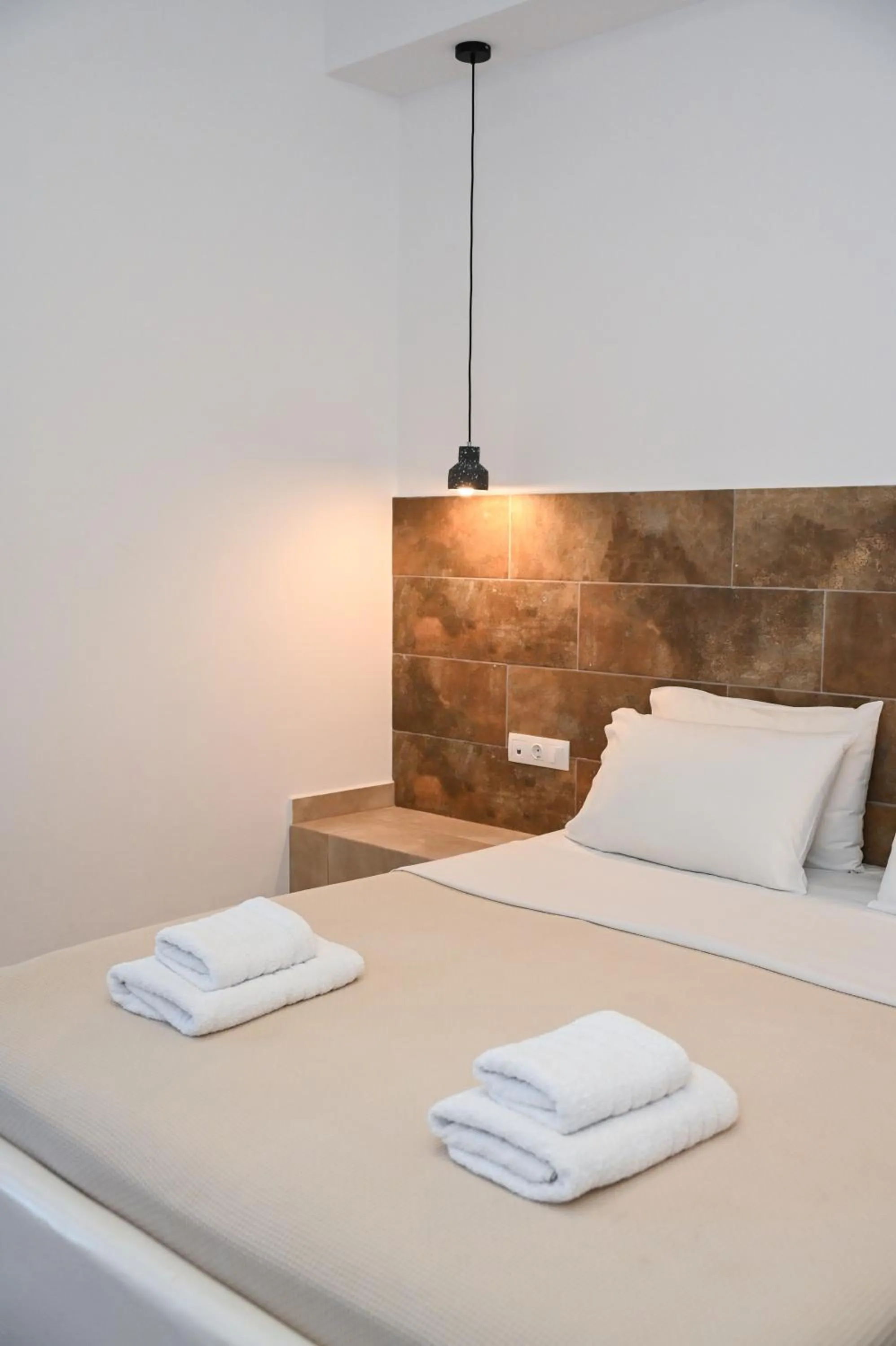 Bed in Glaronisia Hotel