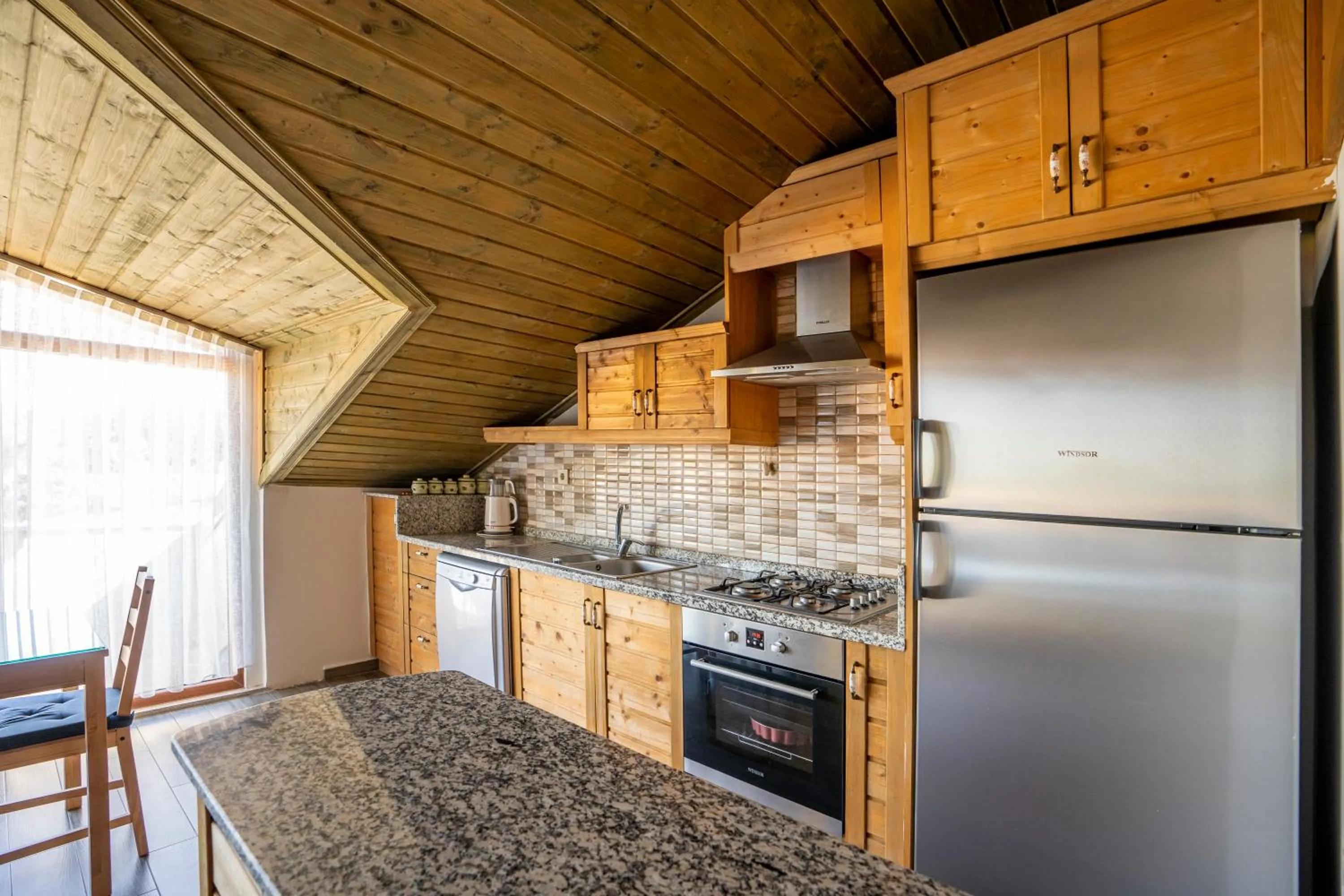 Kitchen or kitchenette in XOX Apart Hotel