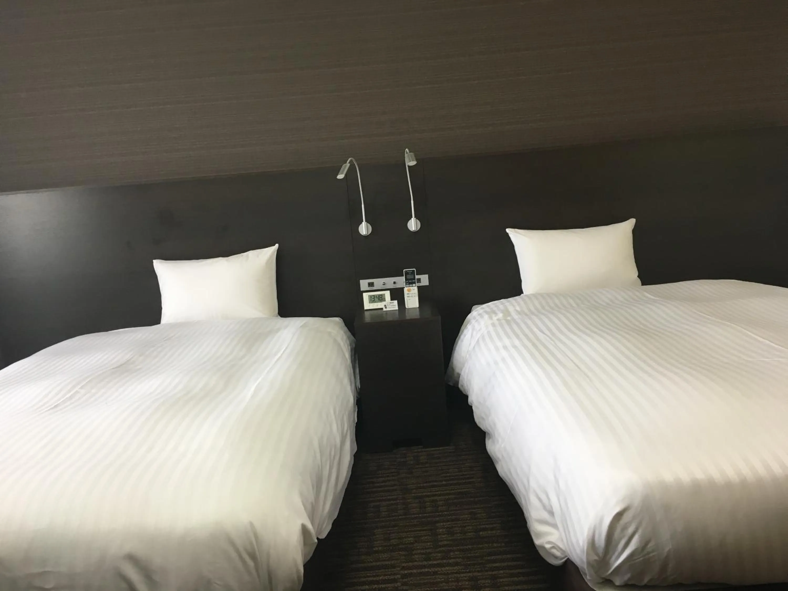 Bedroom, Bed in KKR Hotel Nagoya