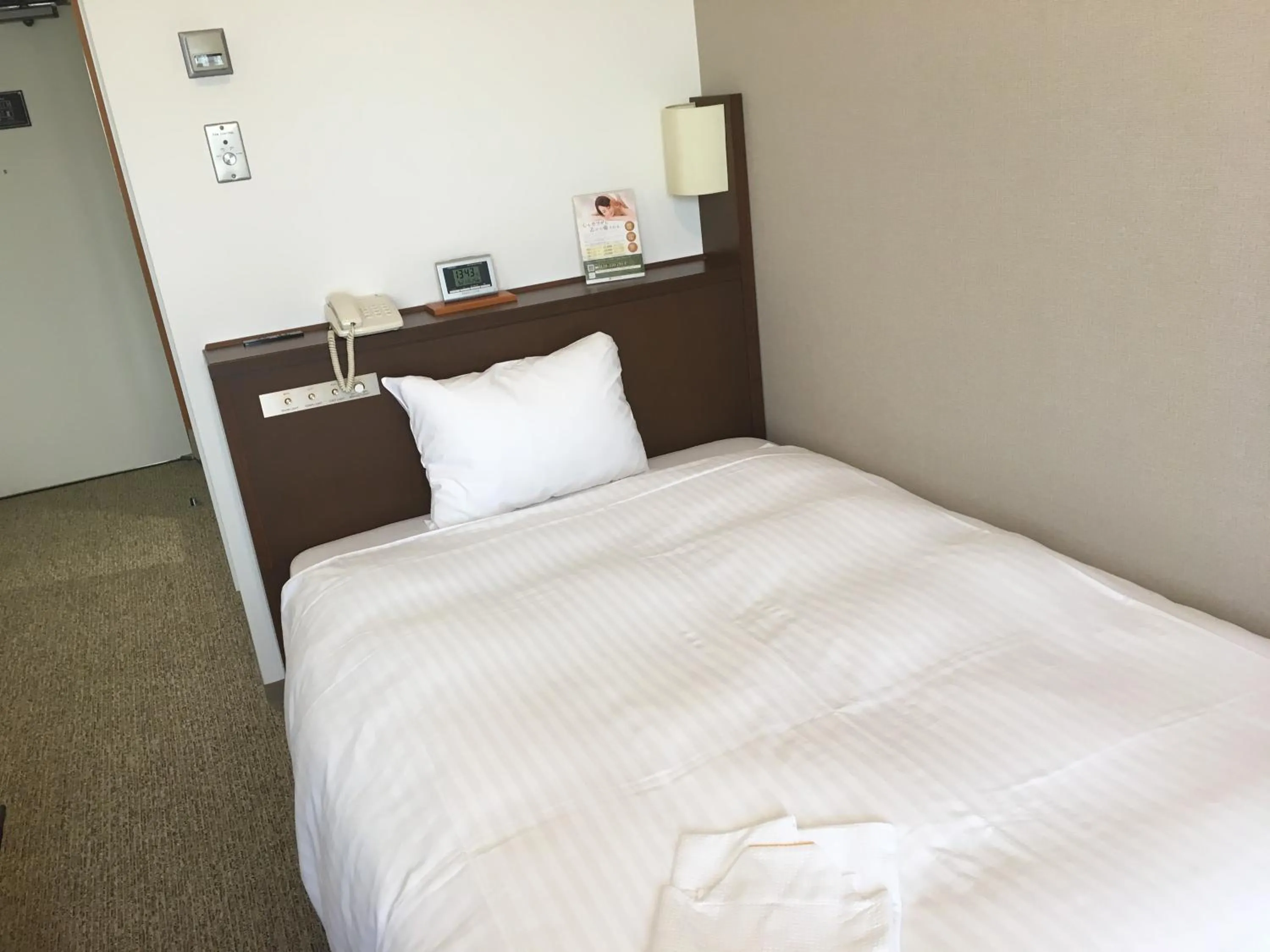 Bedroom, Bed in KKR Hotel Nagoya