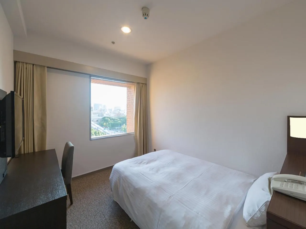 Bedroom, Bed in KKR Hotel Nagoya