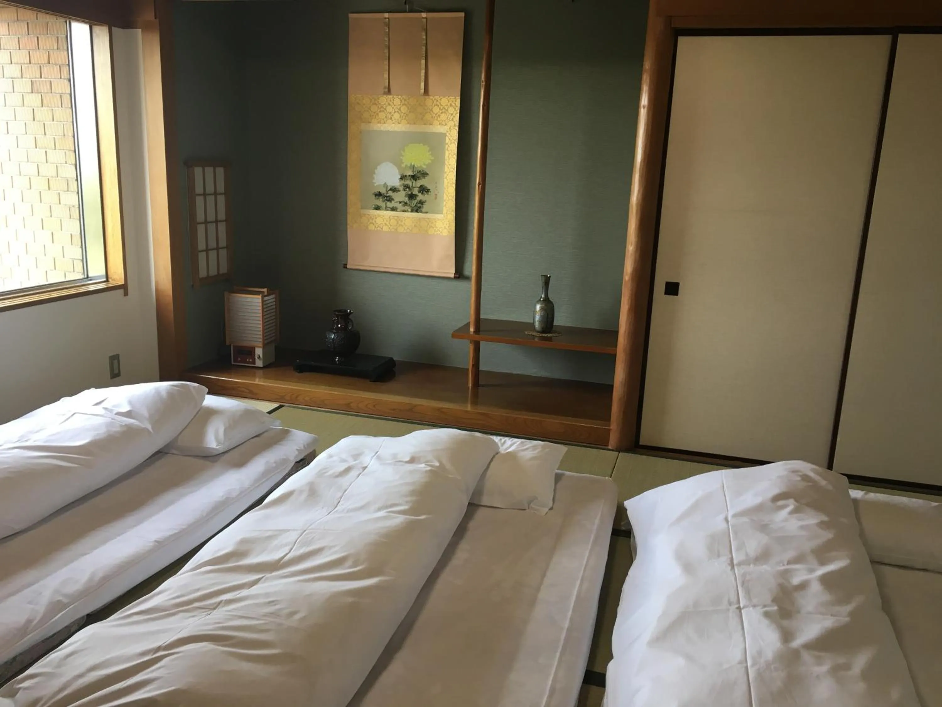 Photo of the whole room, Bed in KKR Hotel Nagoya