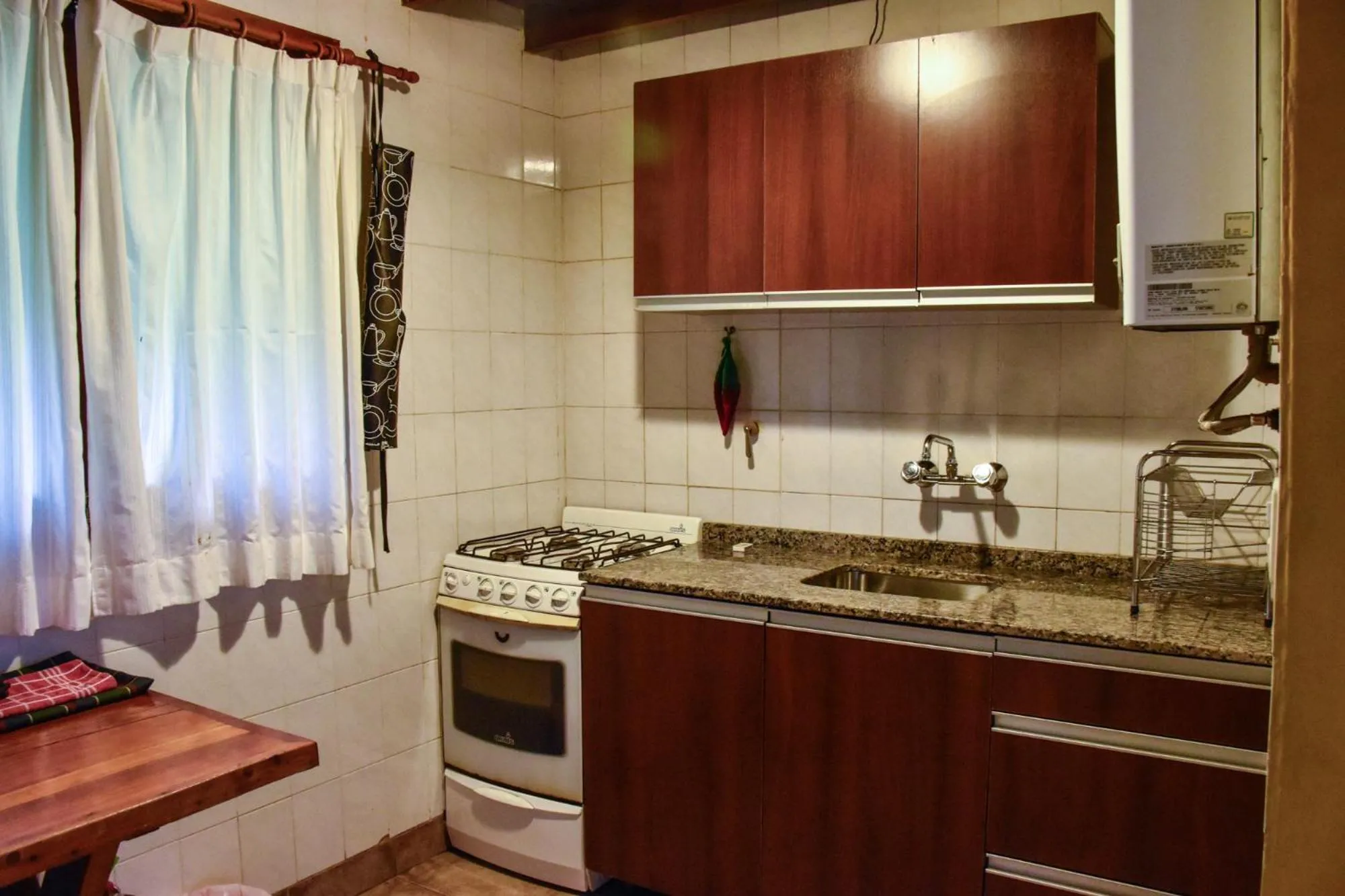Kitchen or kitchenette in Cabañas Villa Pañil