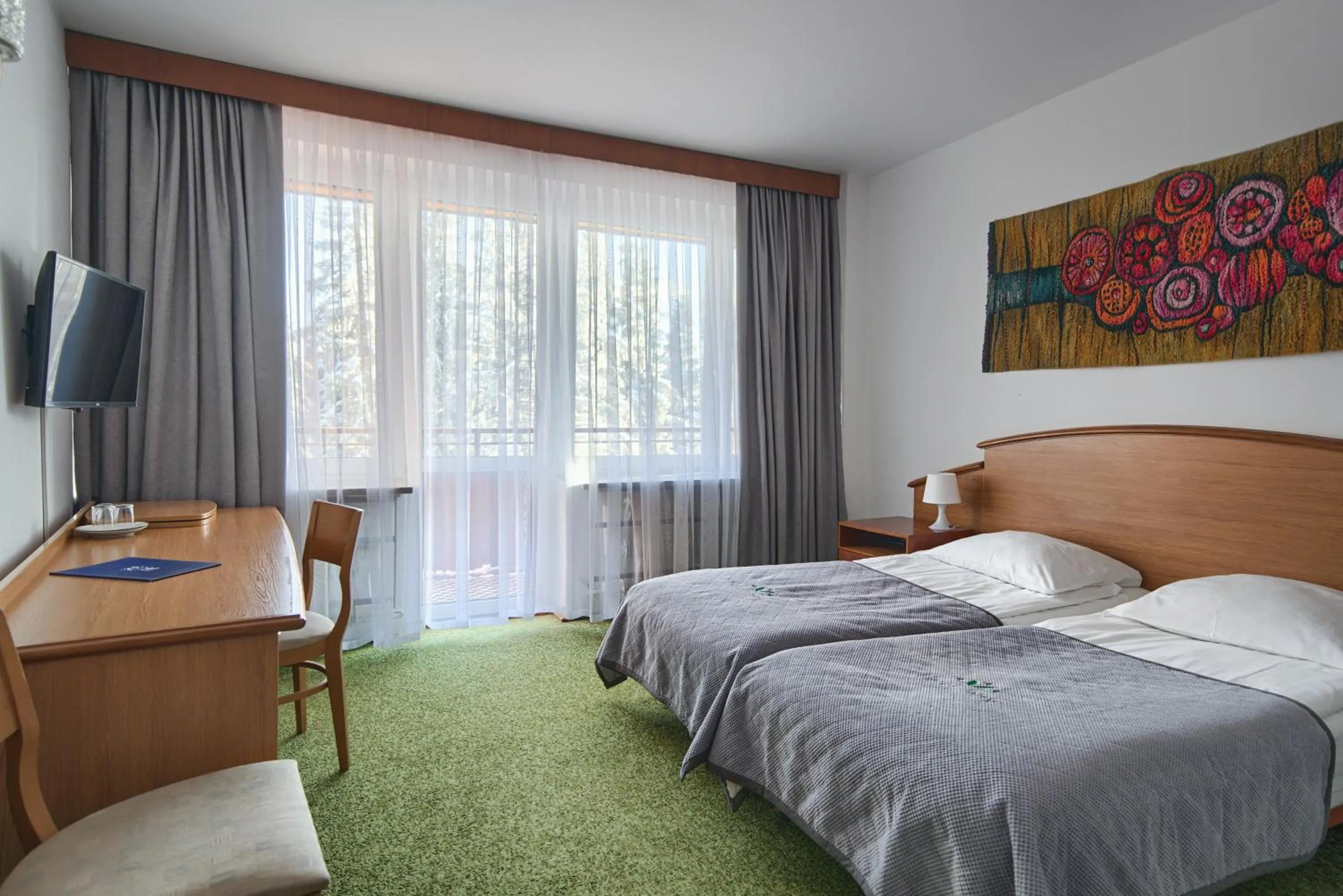 Bed in Zespół Tatry - Hotel Tatry i Budynek Turystyczny