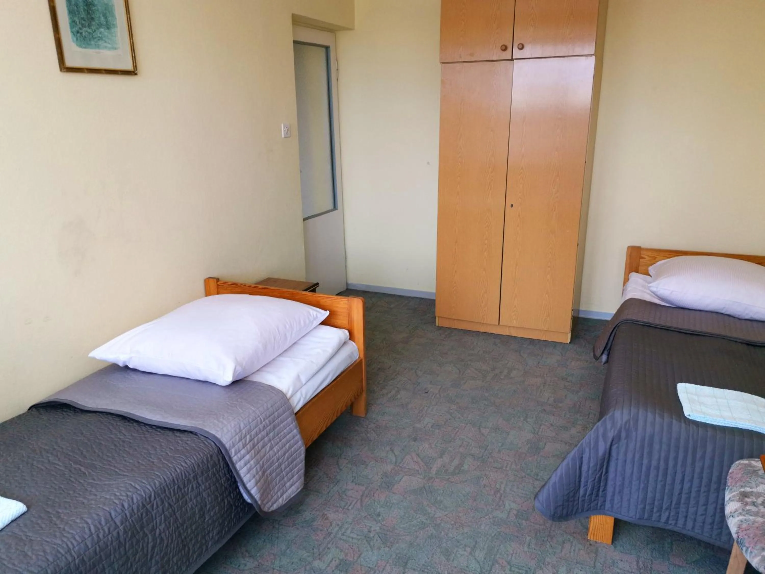 Bed in Zespół Tatry - Hotel Tatry i Budynek Turystyczny