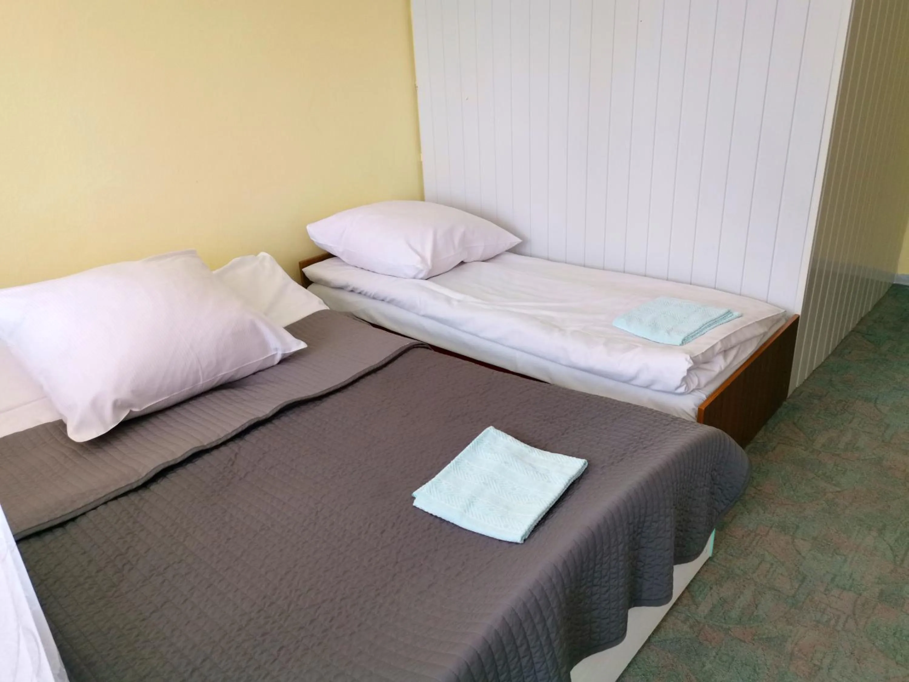 Bed in Zespół Tatry - Hotel Tatry i Budynek Turystyczny