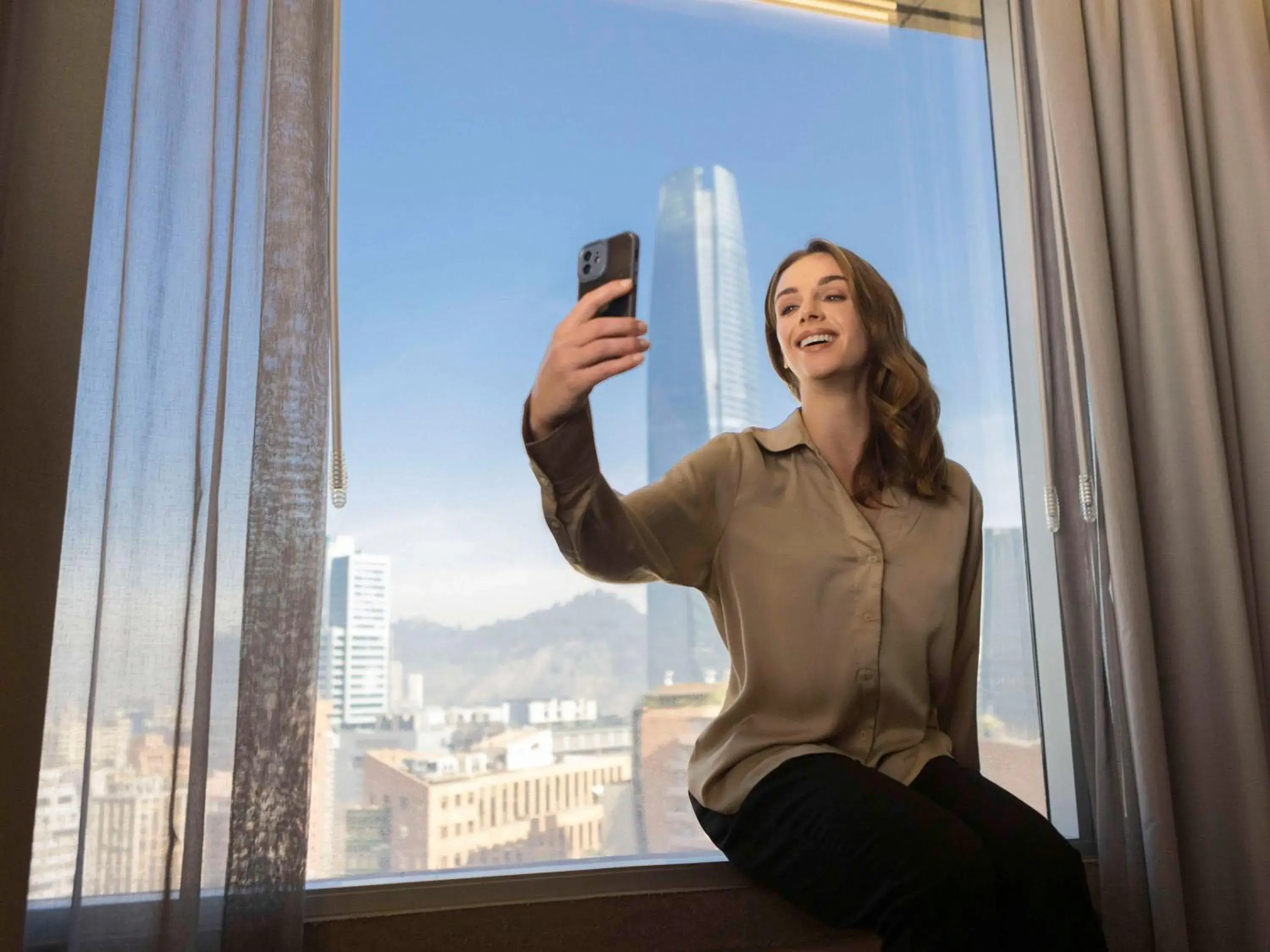 Bedroom in Pullman Santiago El Bosque Bedroom in Pullman Santiago El Bosque
