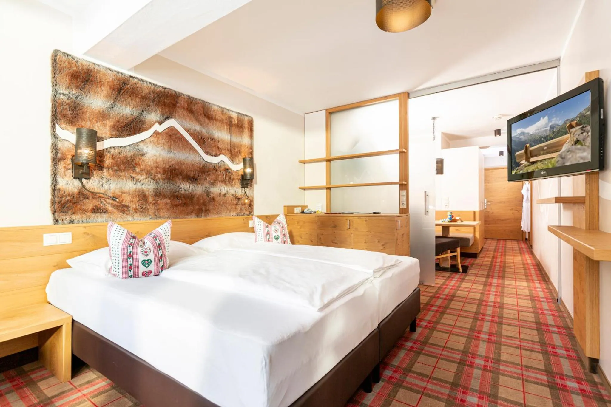 Photo of the whole room, Bed in Kinder- & Gletscherhotel Hintertuxerhof