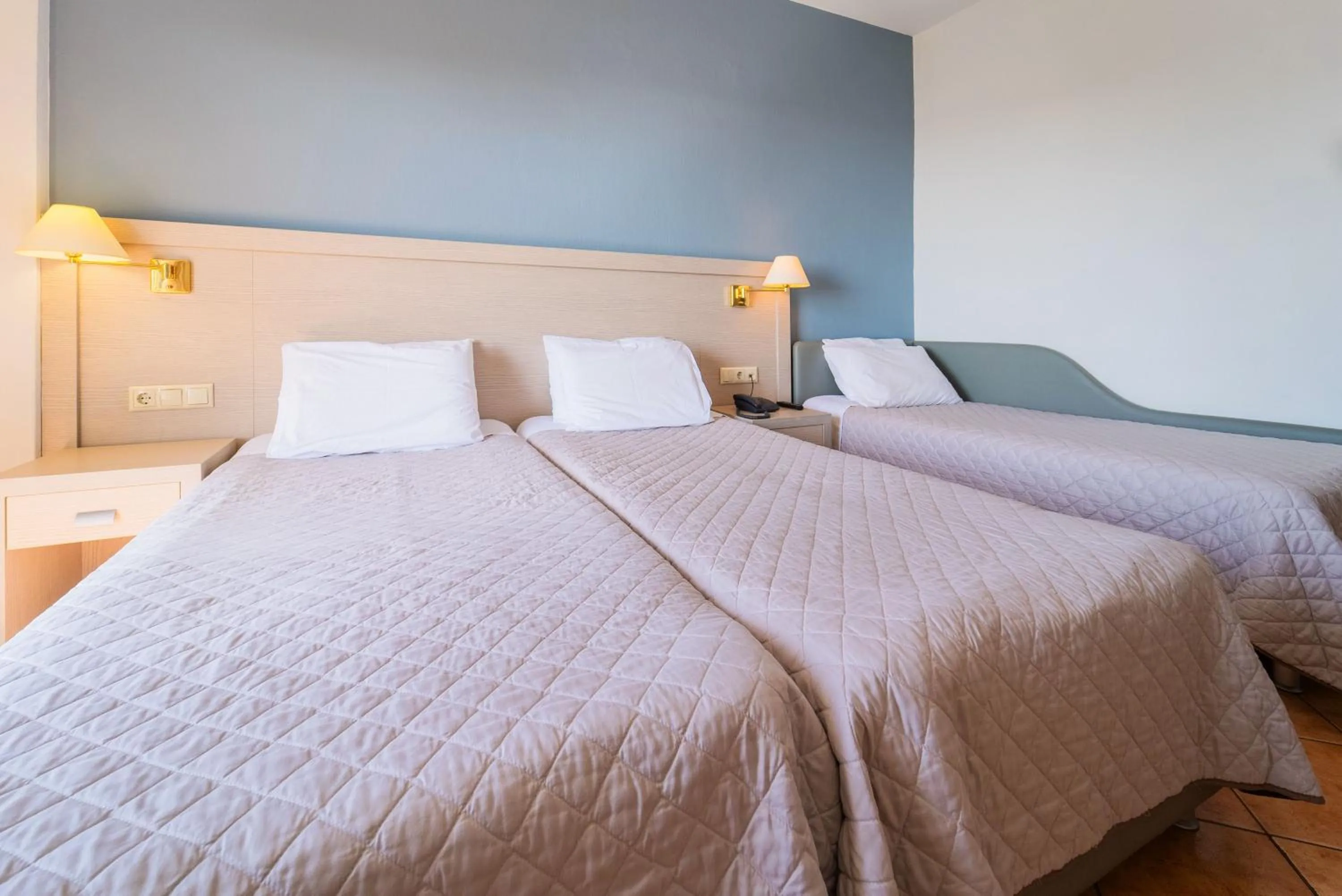 Bed in Oceanis Hotel