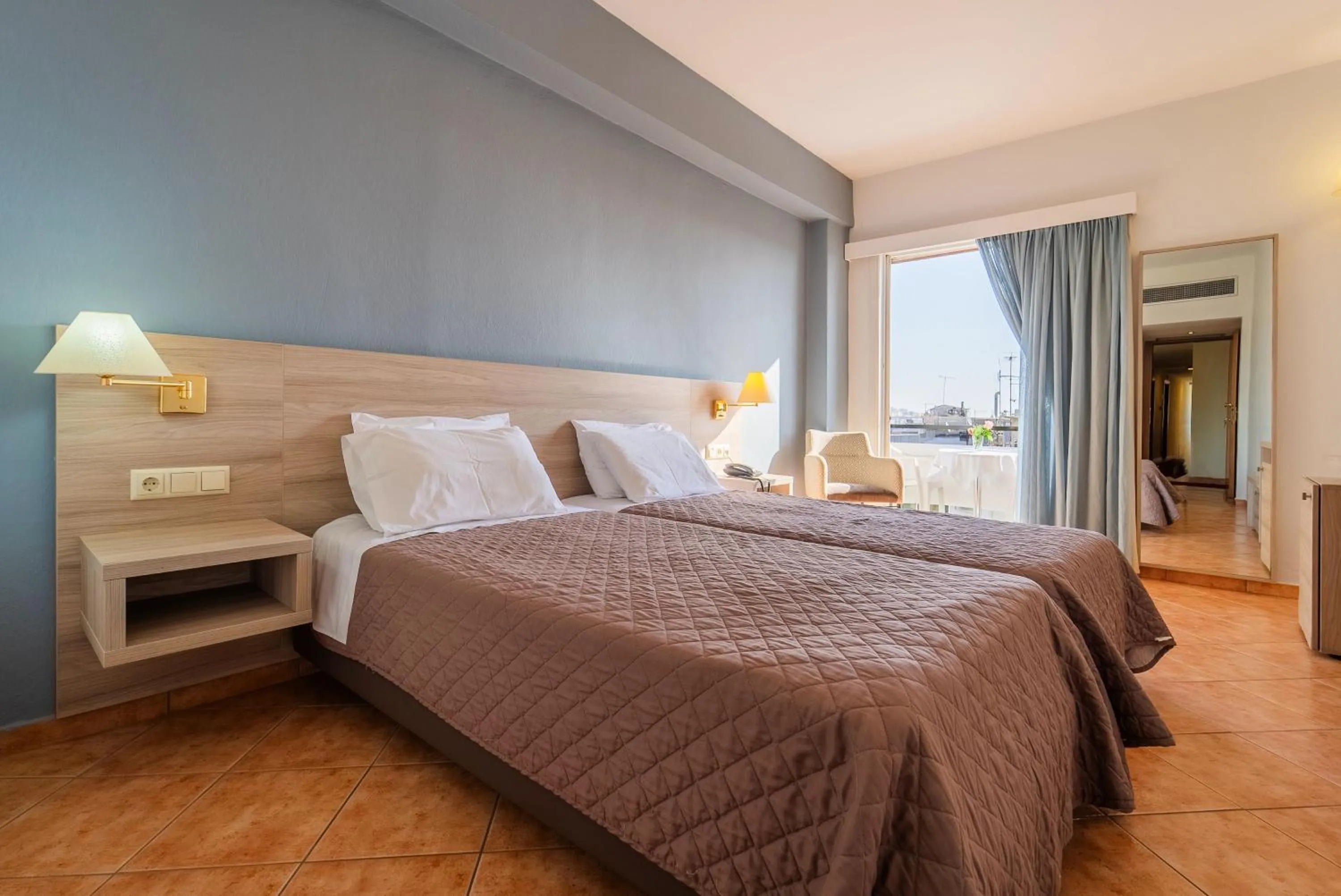 Bed in Oceanis Hotel