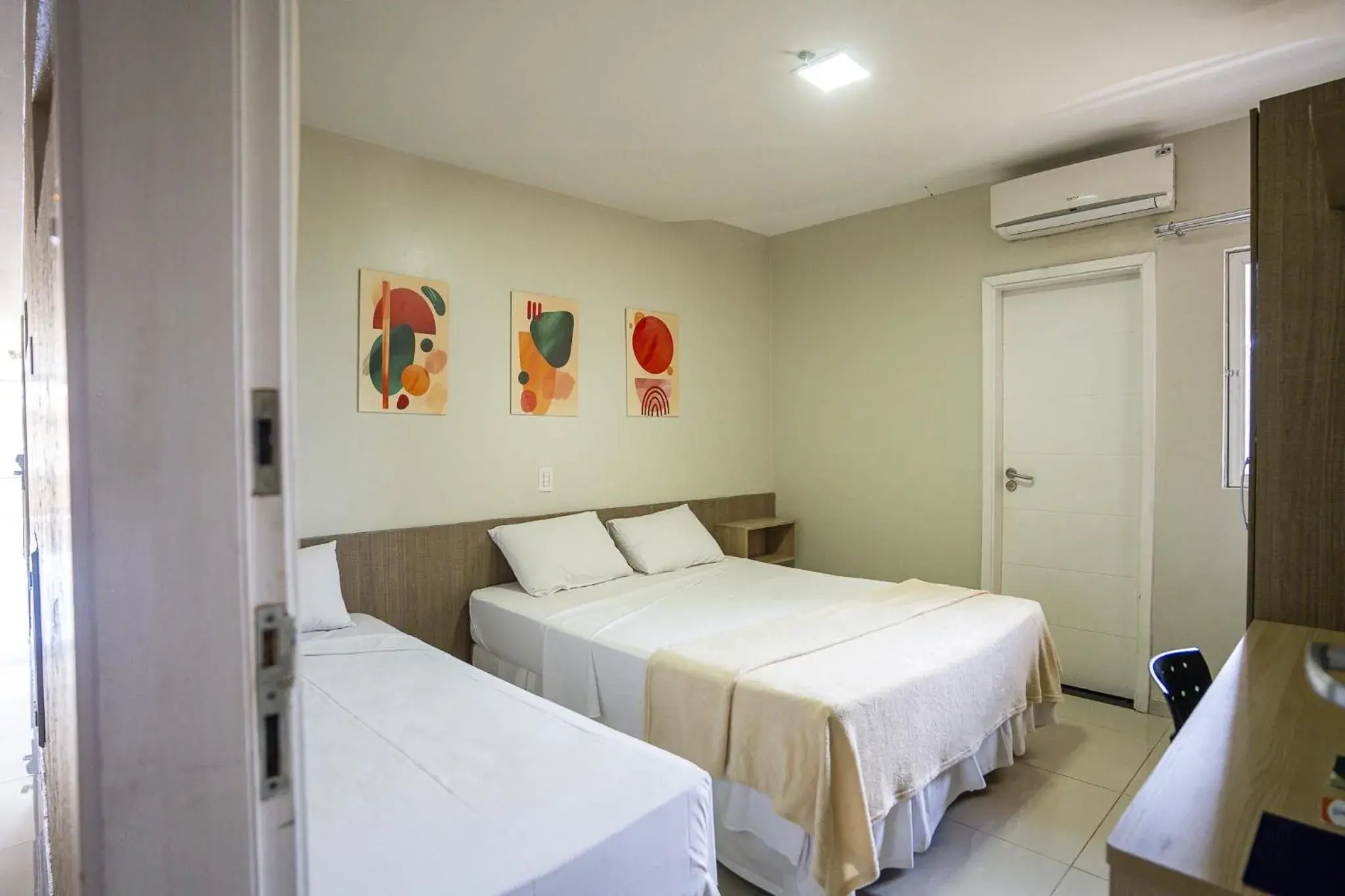 Standard Triple Room in Hotel Ilha Costeira Standard Triple Room in Hotel Ilha Costeira