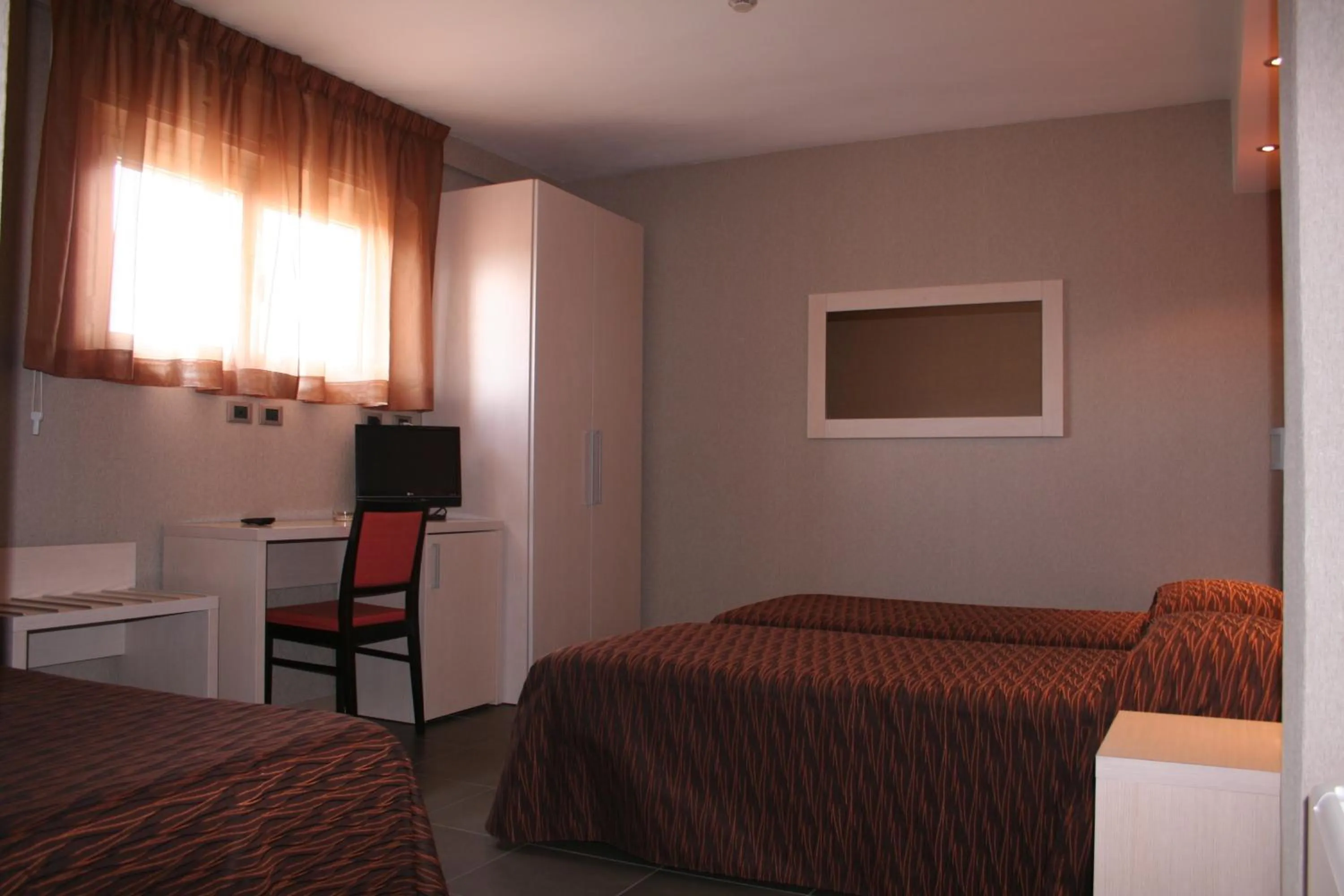 Photo of the whole room, Bed in Hotel Cavour