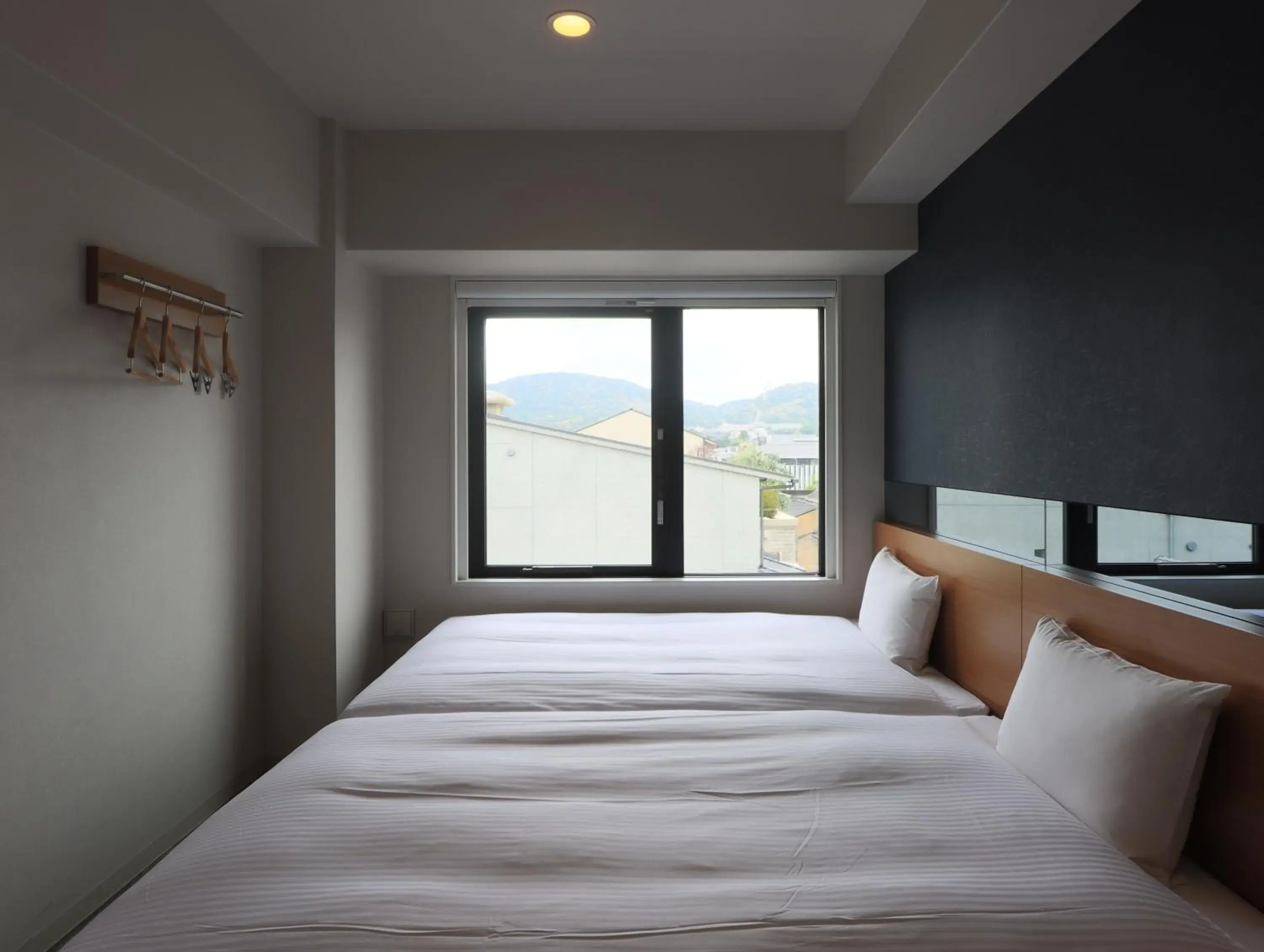 Bed in Hotel Glad One Kyoto Shichijo by M's Bed in Hotel Glad One Kyoto Shichijo by M's