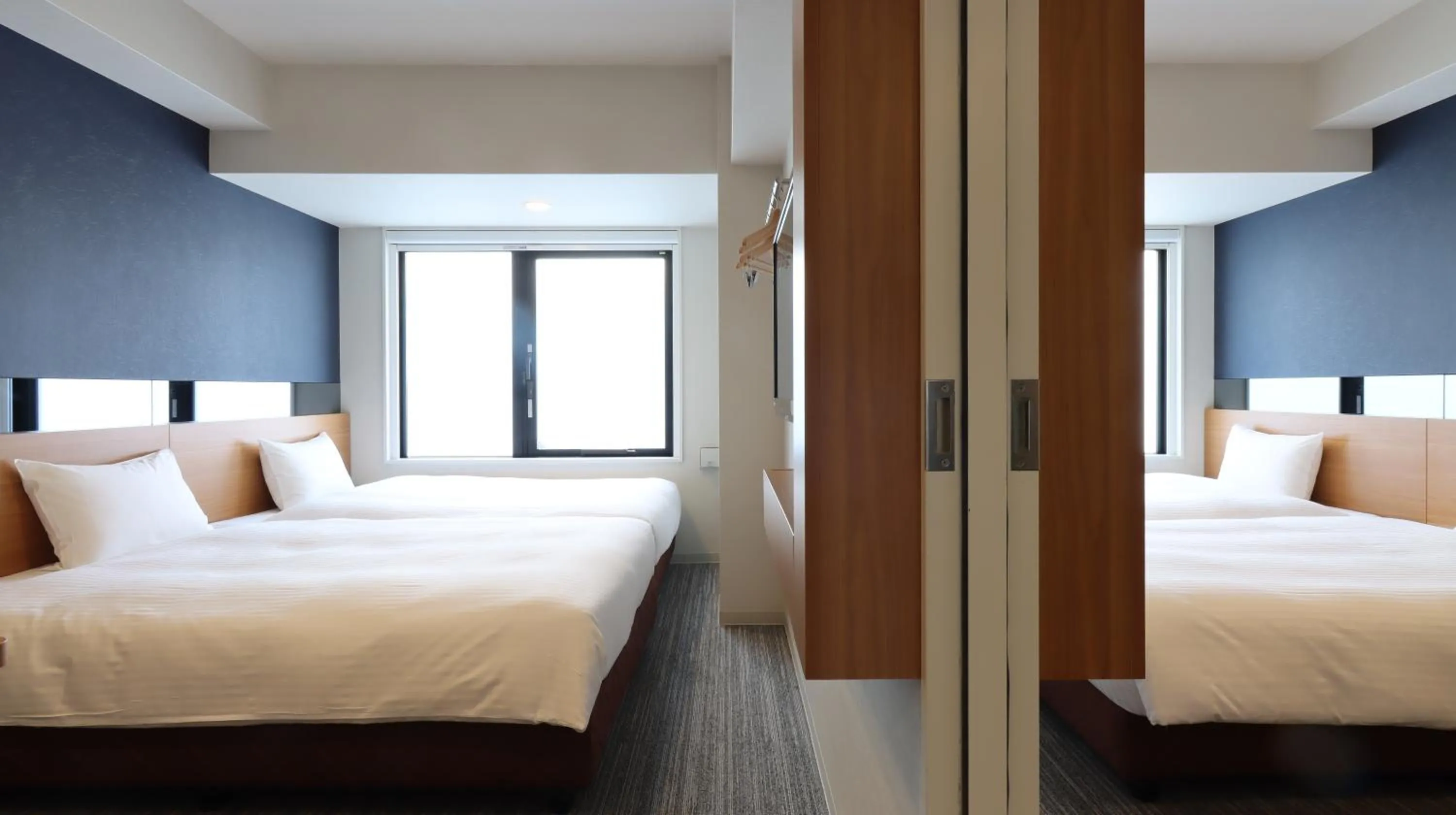 Bed in Hotel Glad One Kyoto Shichijo by M's