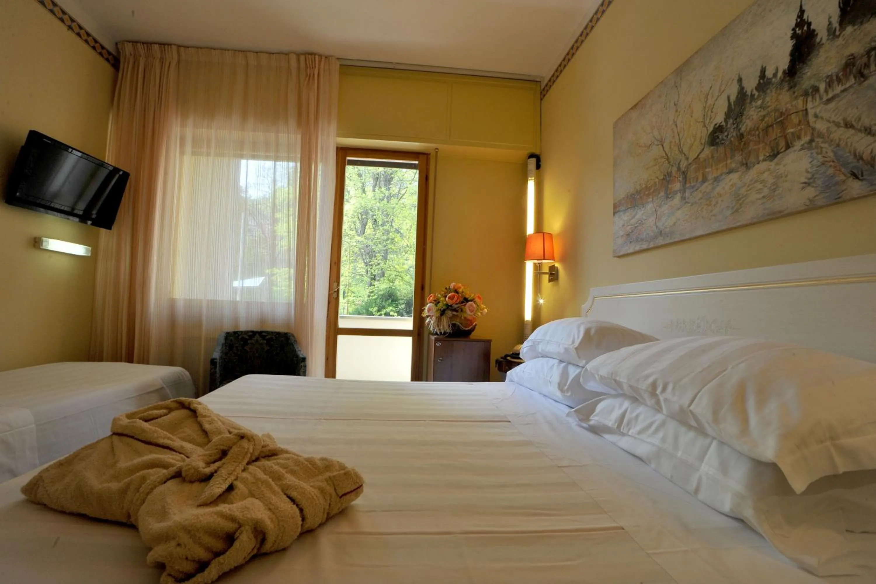 Bed in Hotel Ferrari