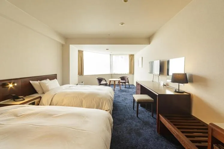 Bed in Awa Kanko Hotel