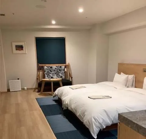 Bed in Awa Kanko Hotel