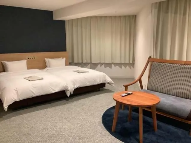 Bed in Awa Kanko Hotel