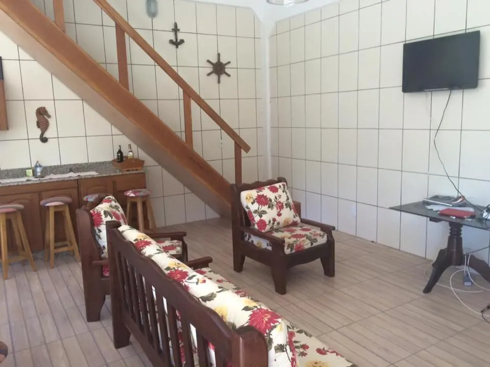 Communal lounge/ TV room in Sobrado Itapoá