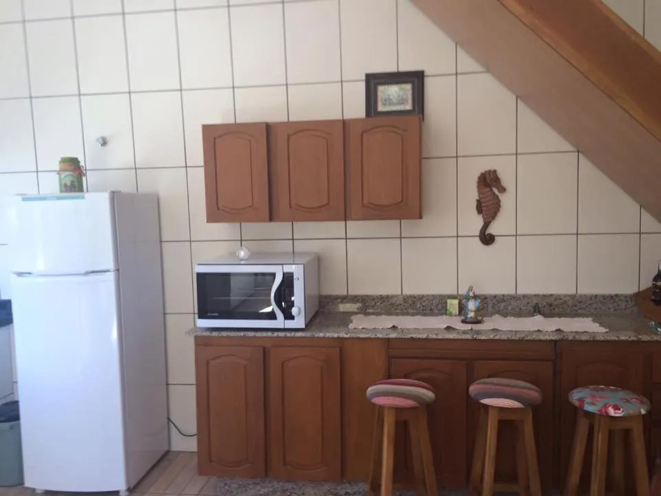 Communal kitchen in Sobrado Itapoá