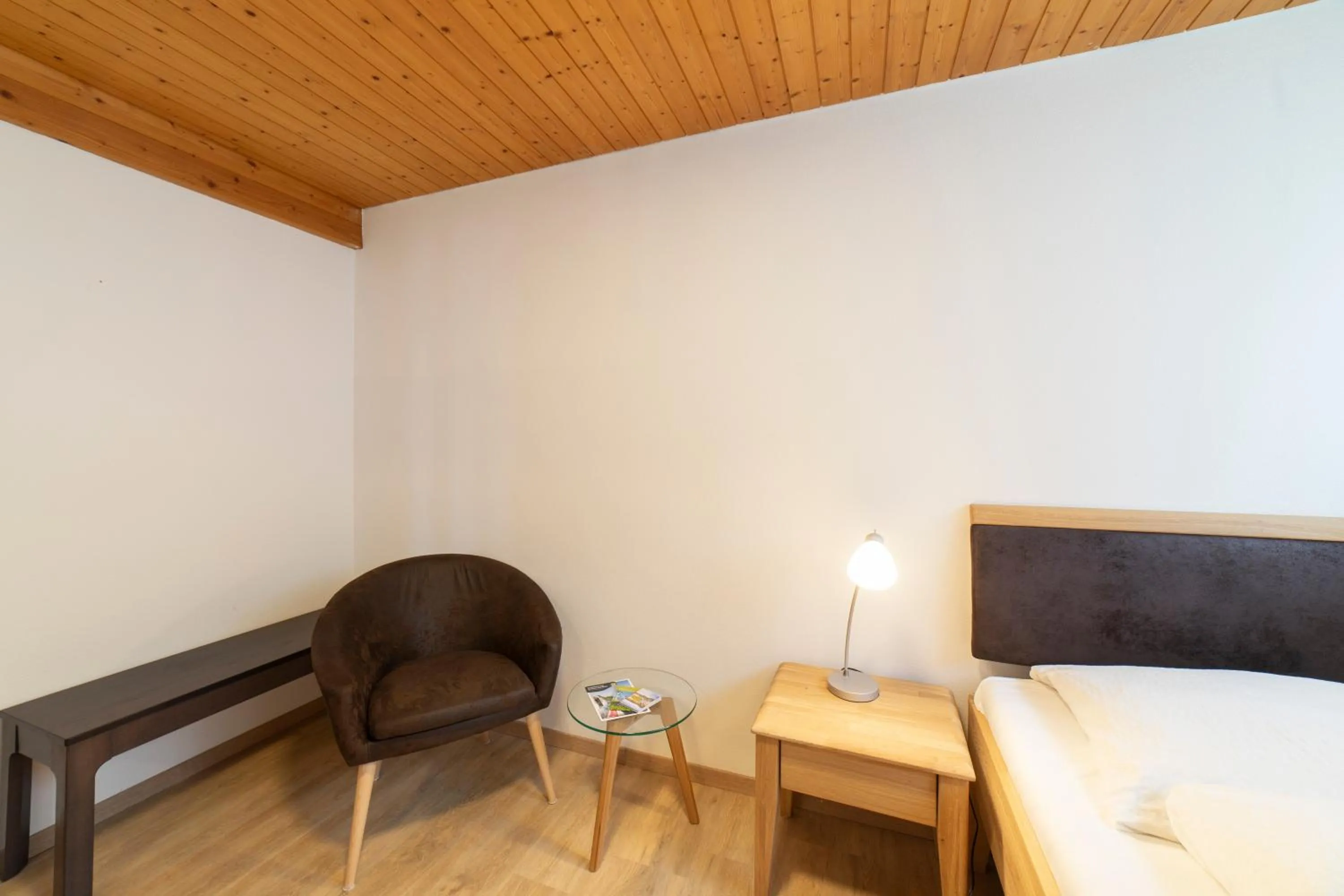 Seating area, Bed in Hotel Sonne