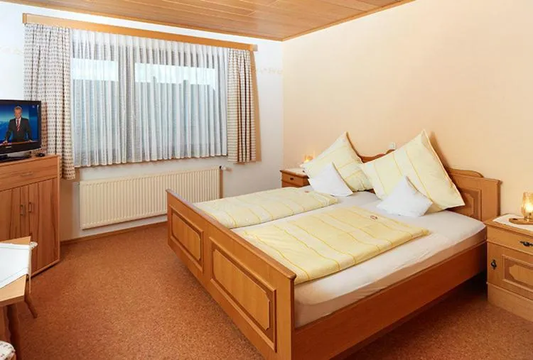 Bed in Hotel Garni Assion