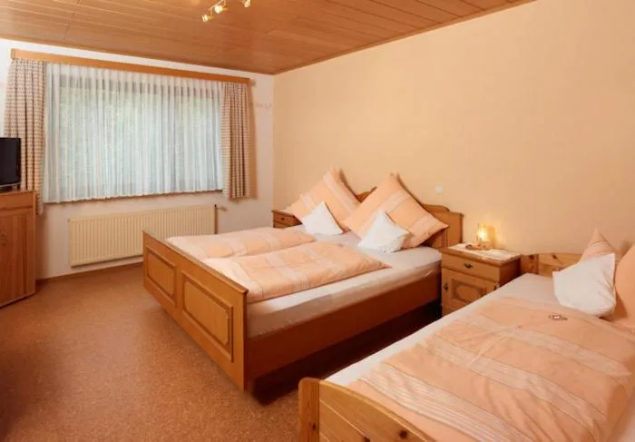 Bed in Hotel Garni Assion