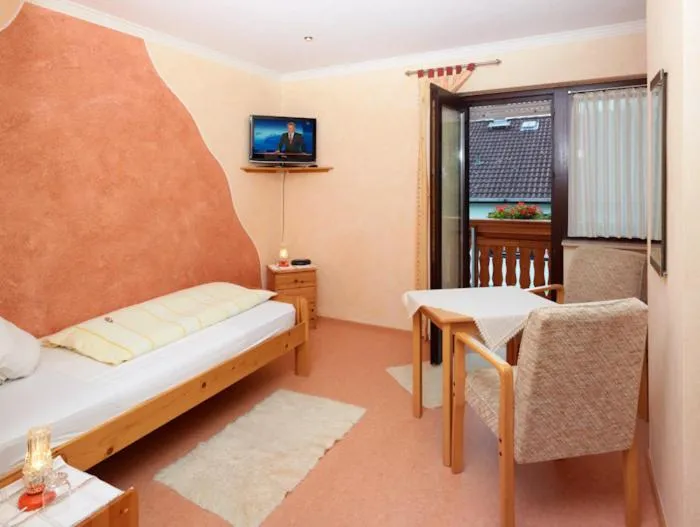 Bed in Hotel Garni Assion