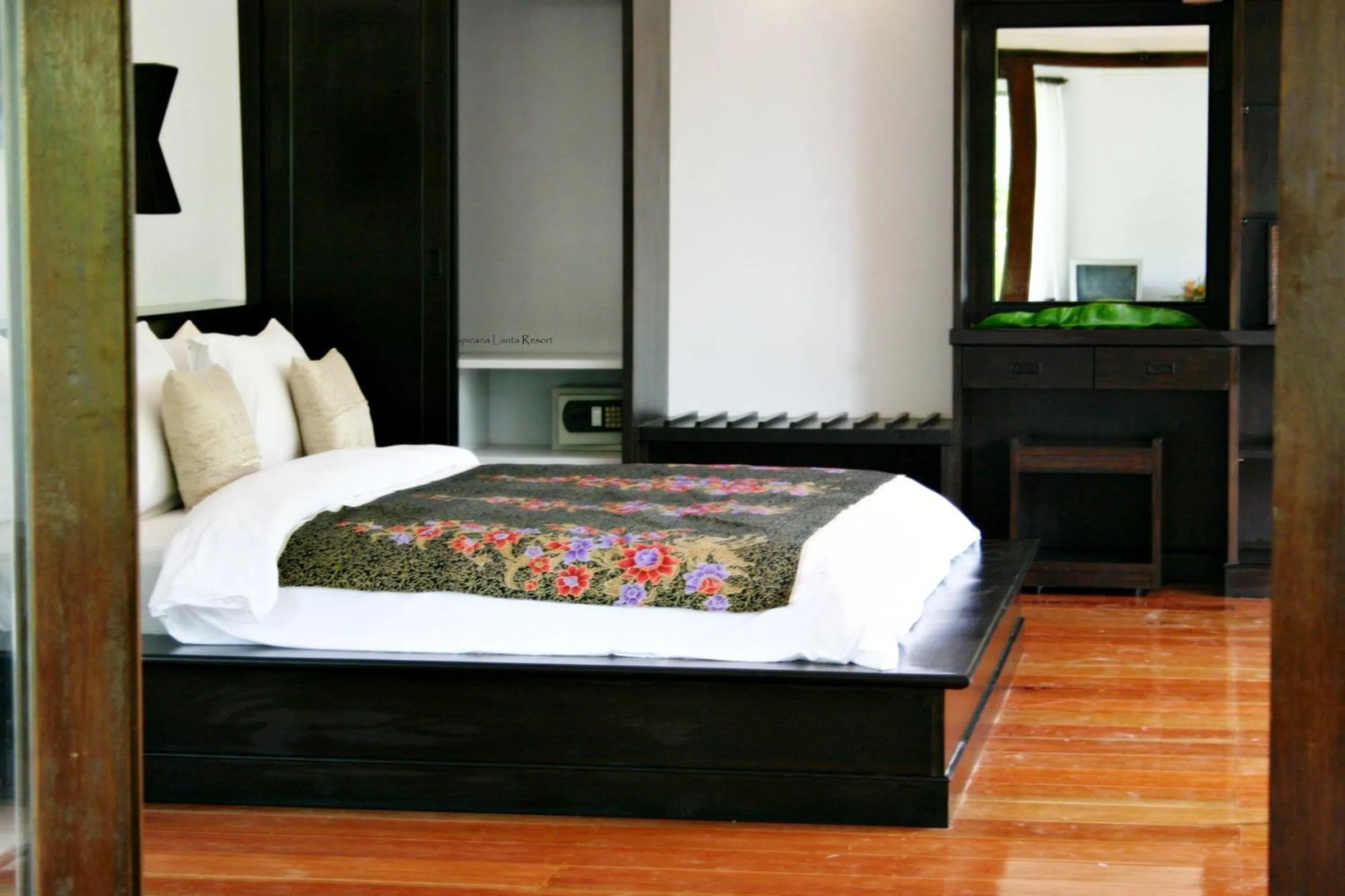 Bed in Tropicana Lanta Resort