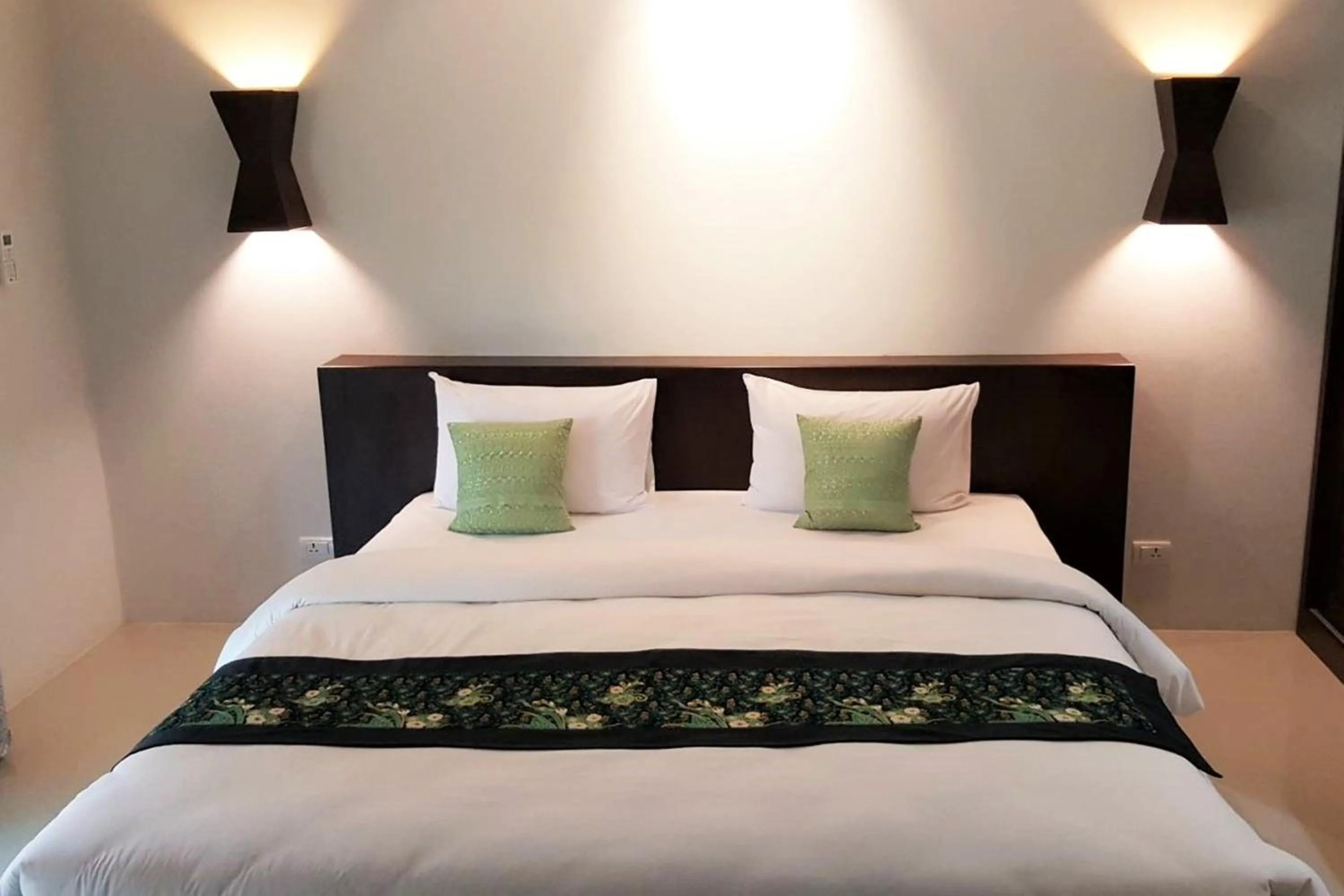 Bed in Tropicana Lanta Resort