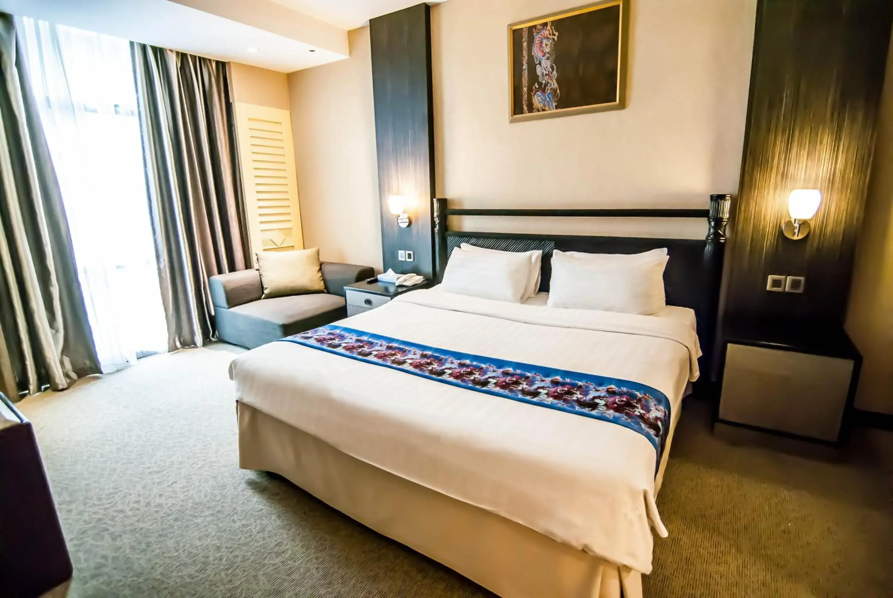 Bed in KK Times Square Hotel Bed in KK Times Square Hotel