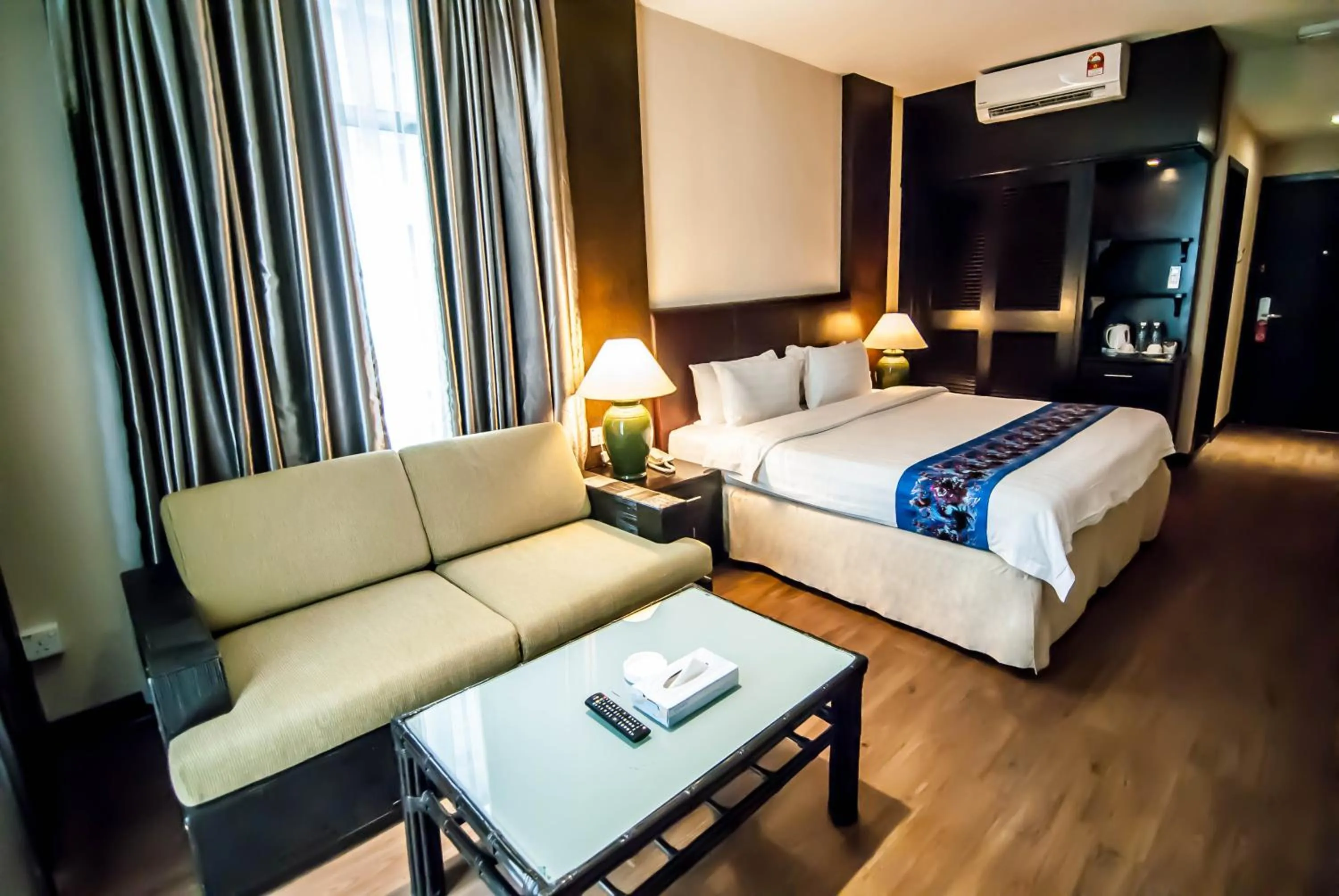 Bed in KK Times Square Hotel