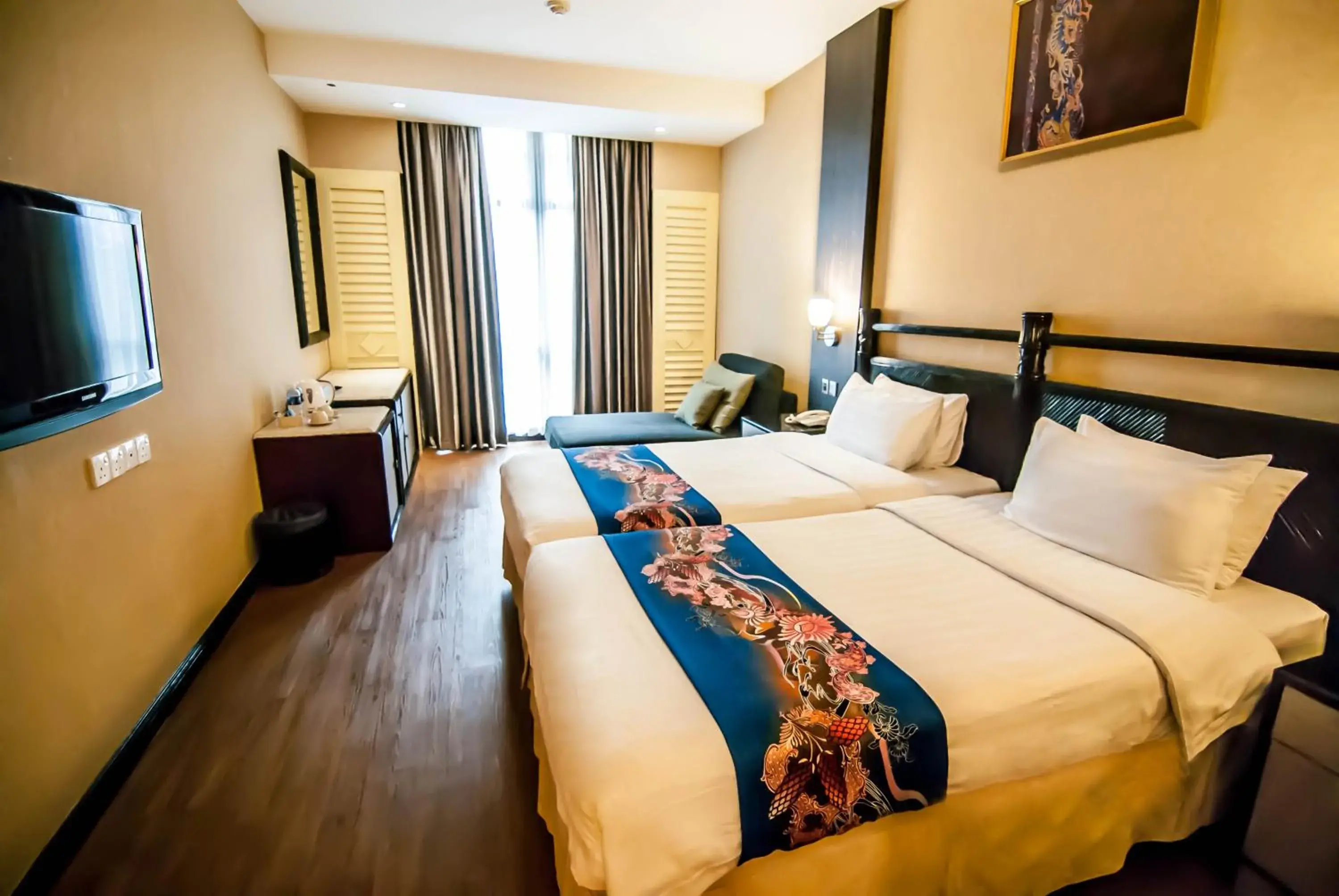 Bed in KK Times Square Hotel Bed in KK Times Square Hotel