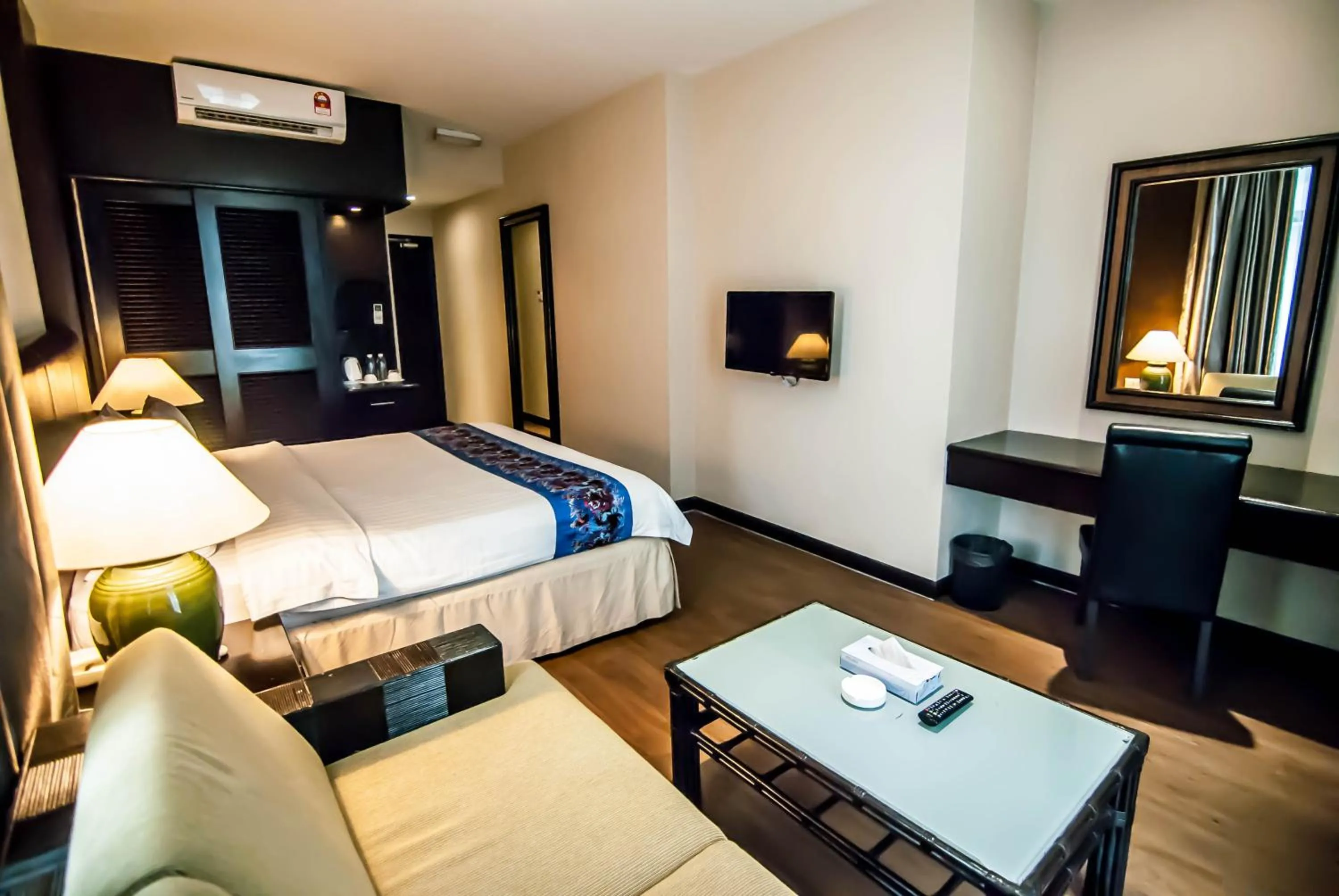 Bed in KK Times Square Hotel