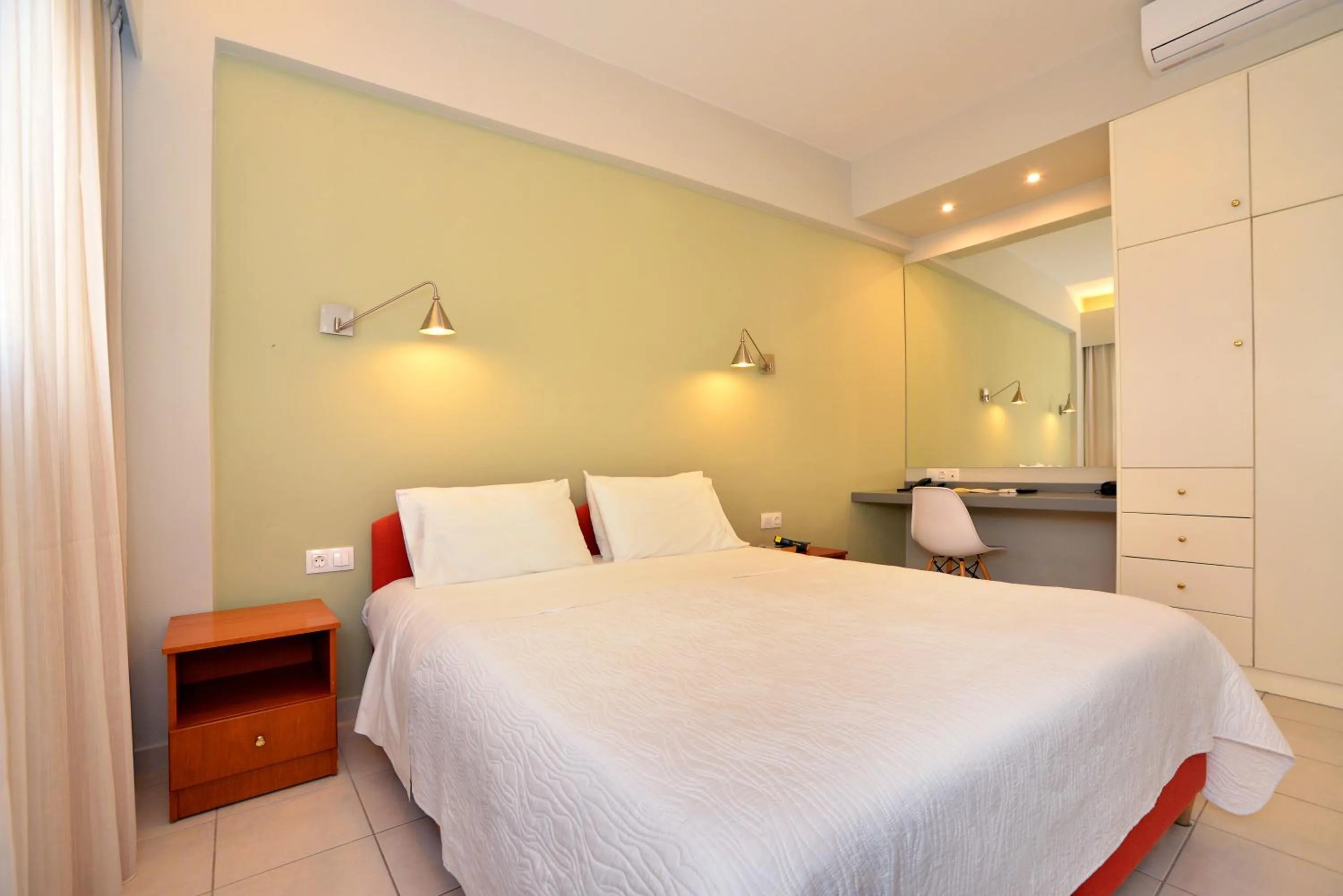 Bed in Theoxenia Hotel Apartments