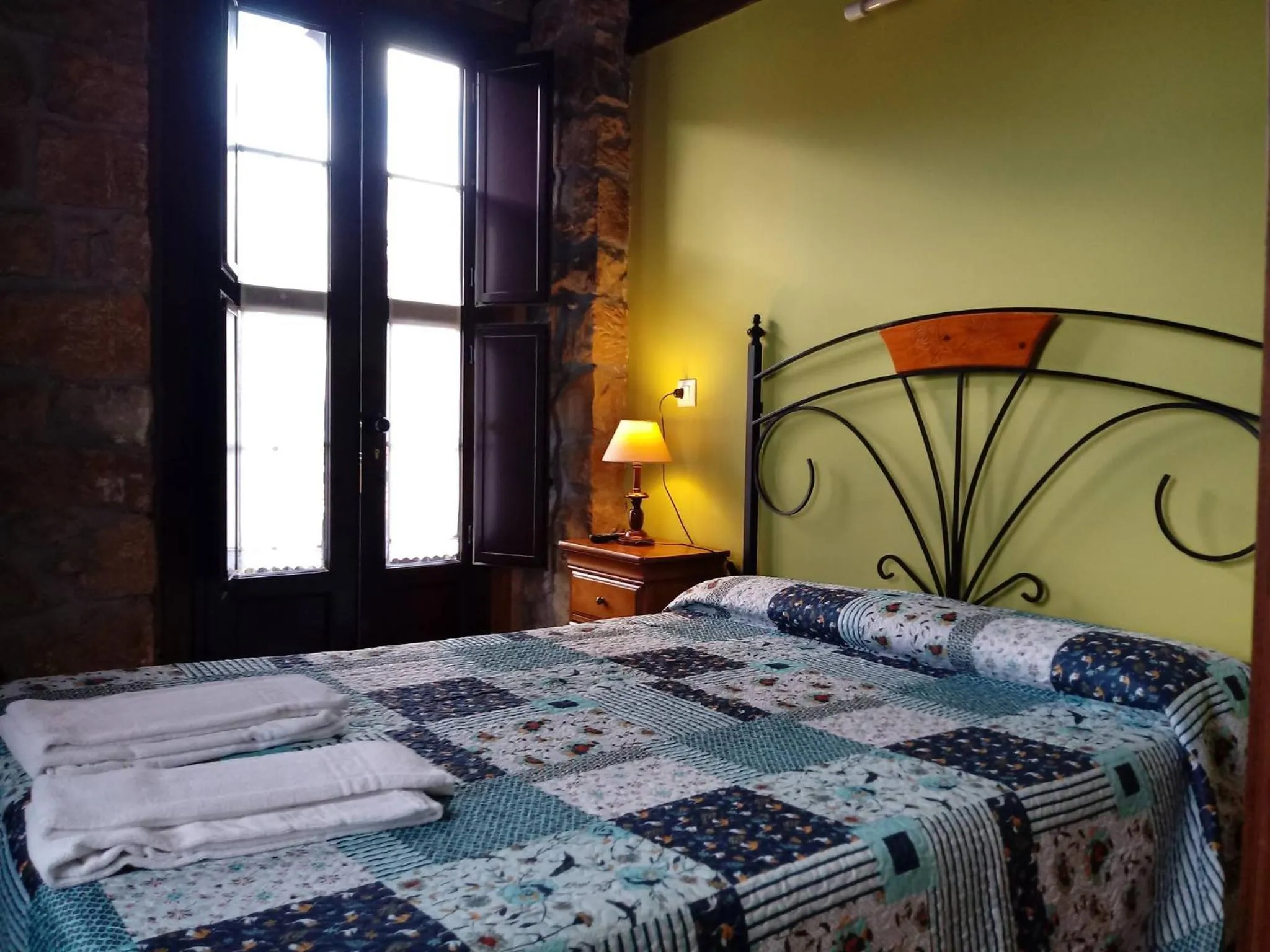 Property building, Bed in Hotel Rural Posada Del Monasterio