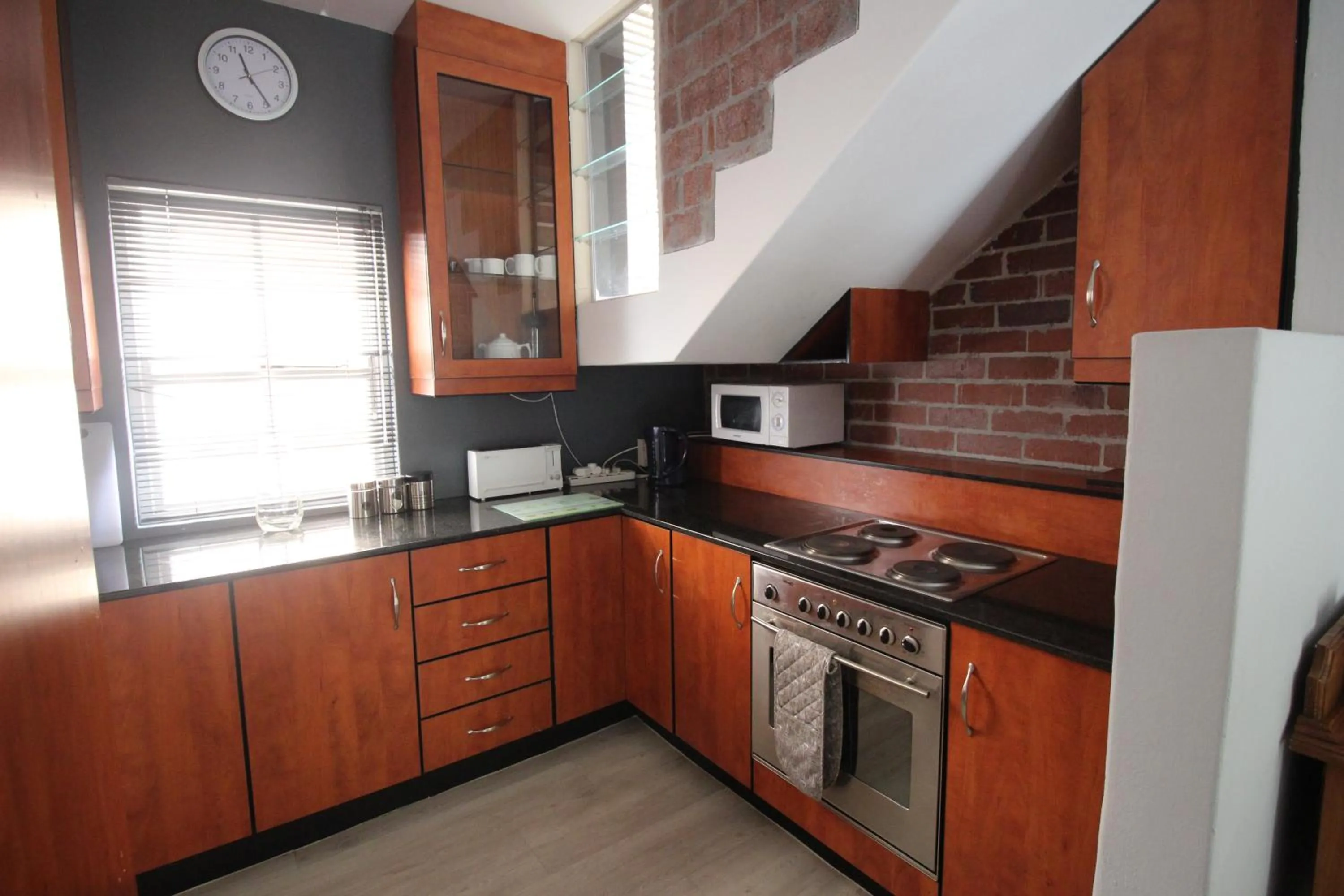 Kitchen or kitchenette in Mountain Manor Guest House & Executive Suites