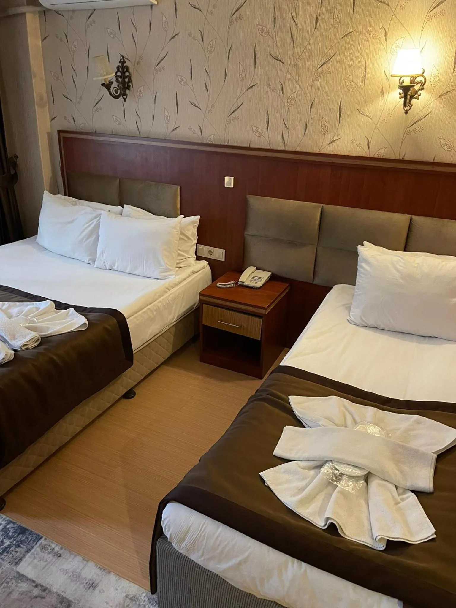 Bed in Hermanos Hotel