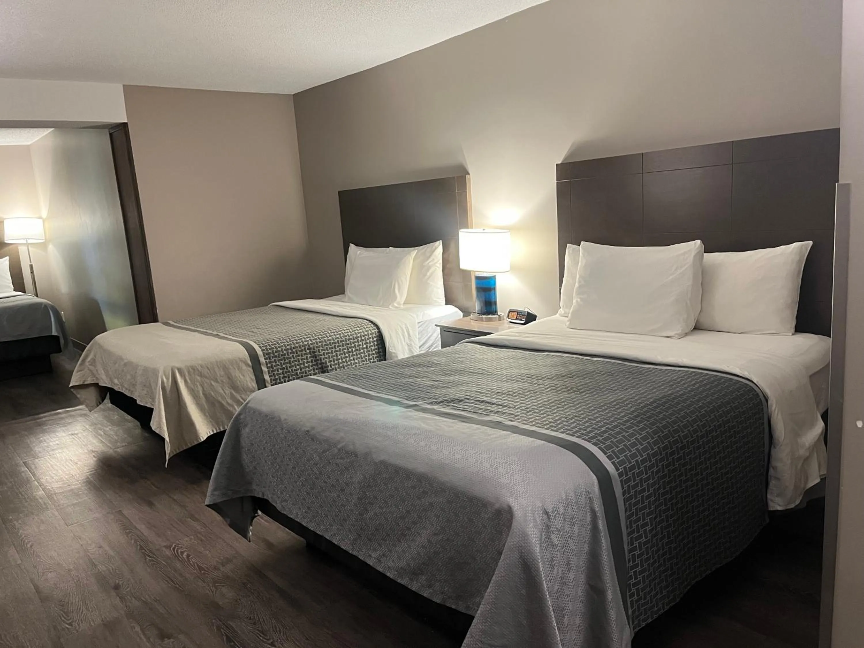Bed in Travelodge Hotel by Wyndham Saskatoon