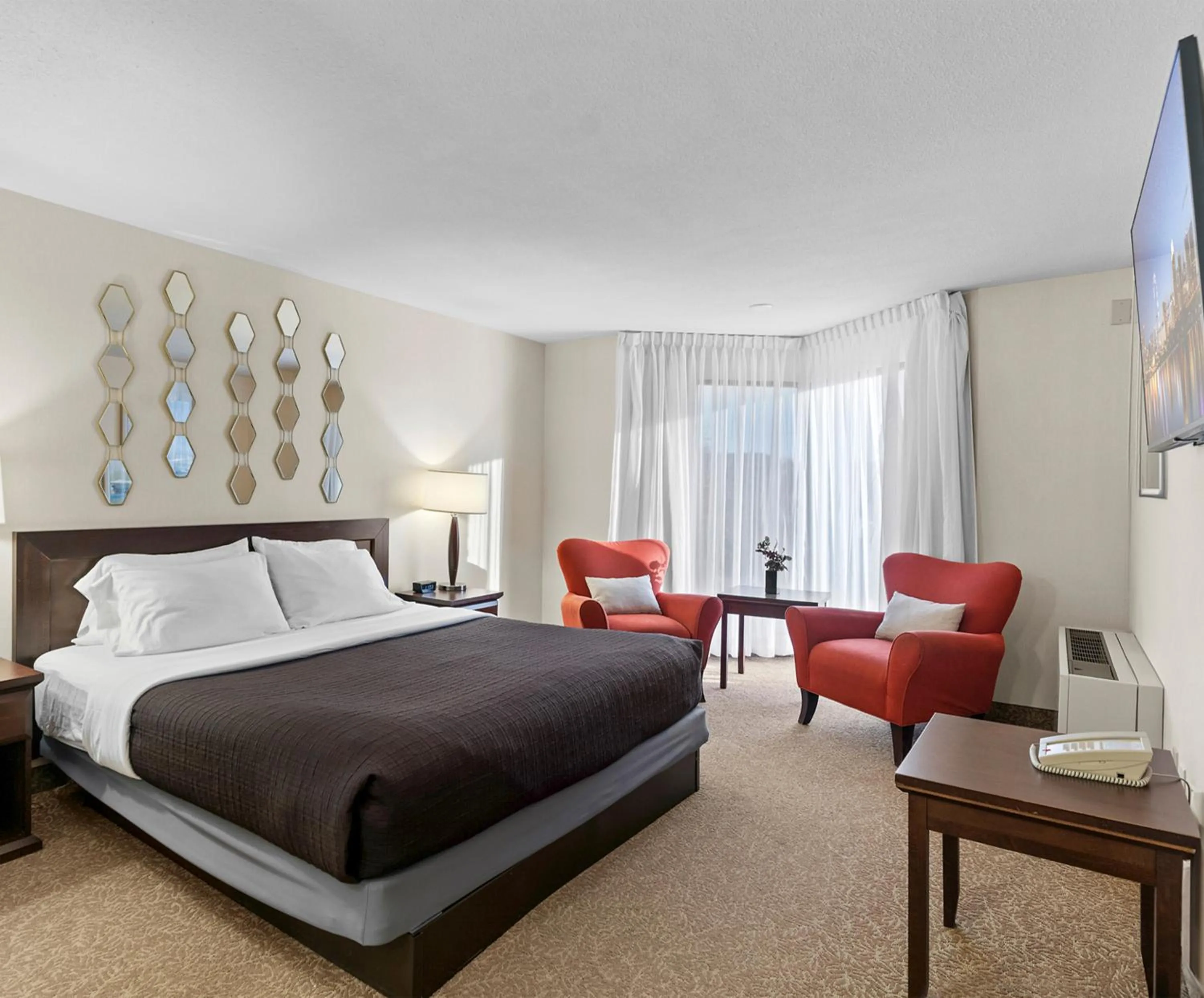 Bed in Travelodge Hotel by Wyndham Saskatoon