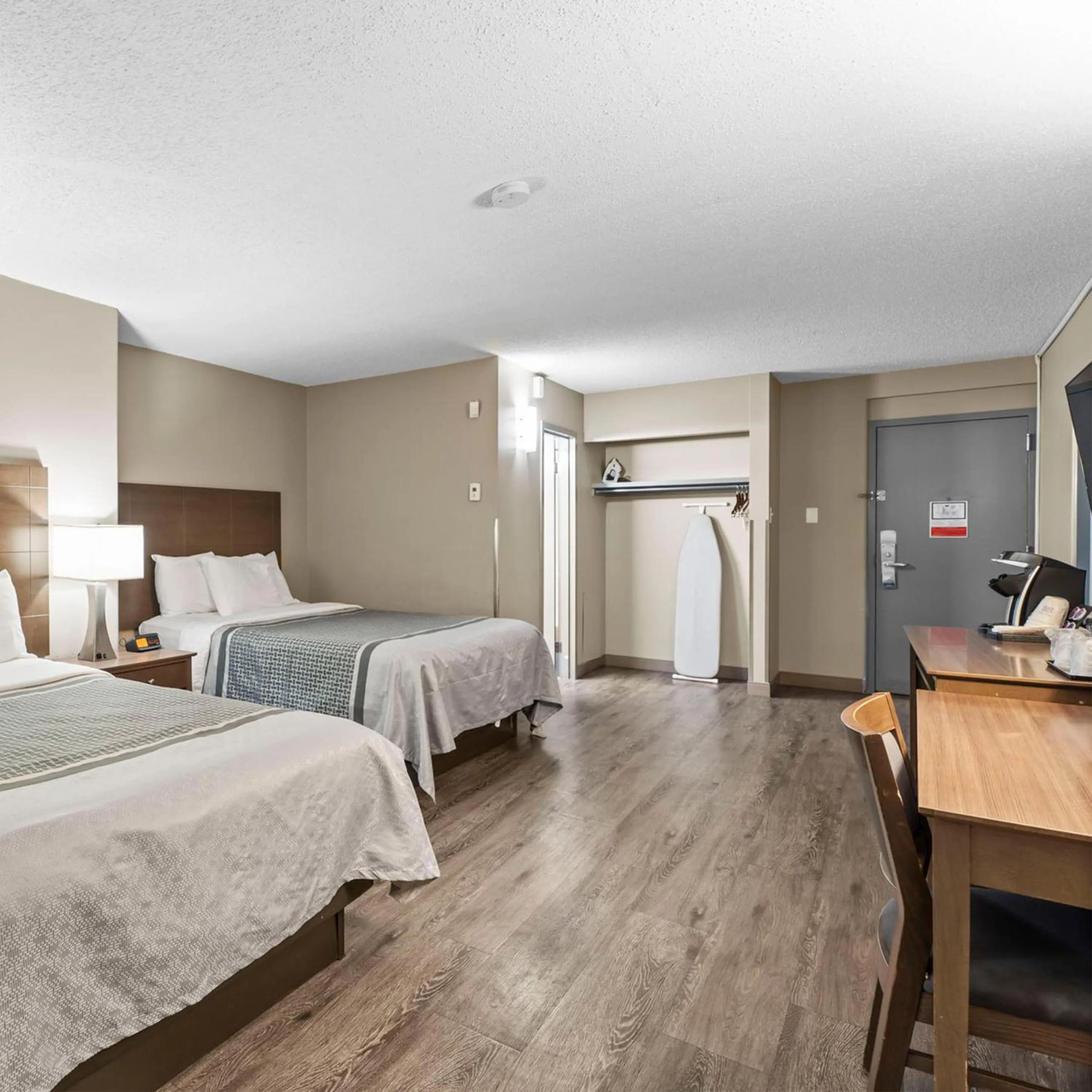 Bed in Travelodge Hotel by Wyndham Saskatoon