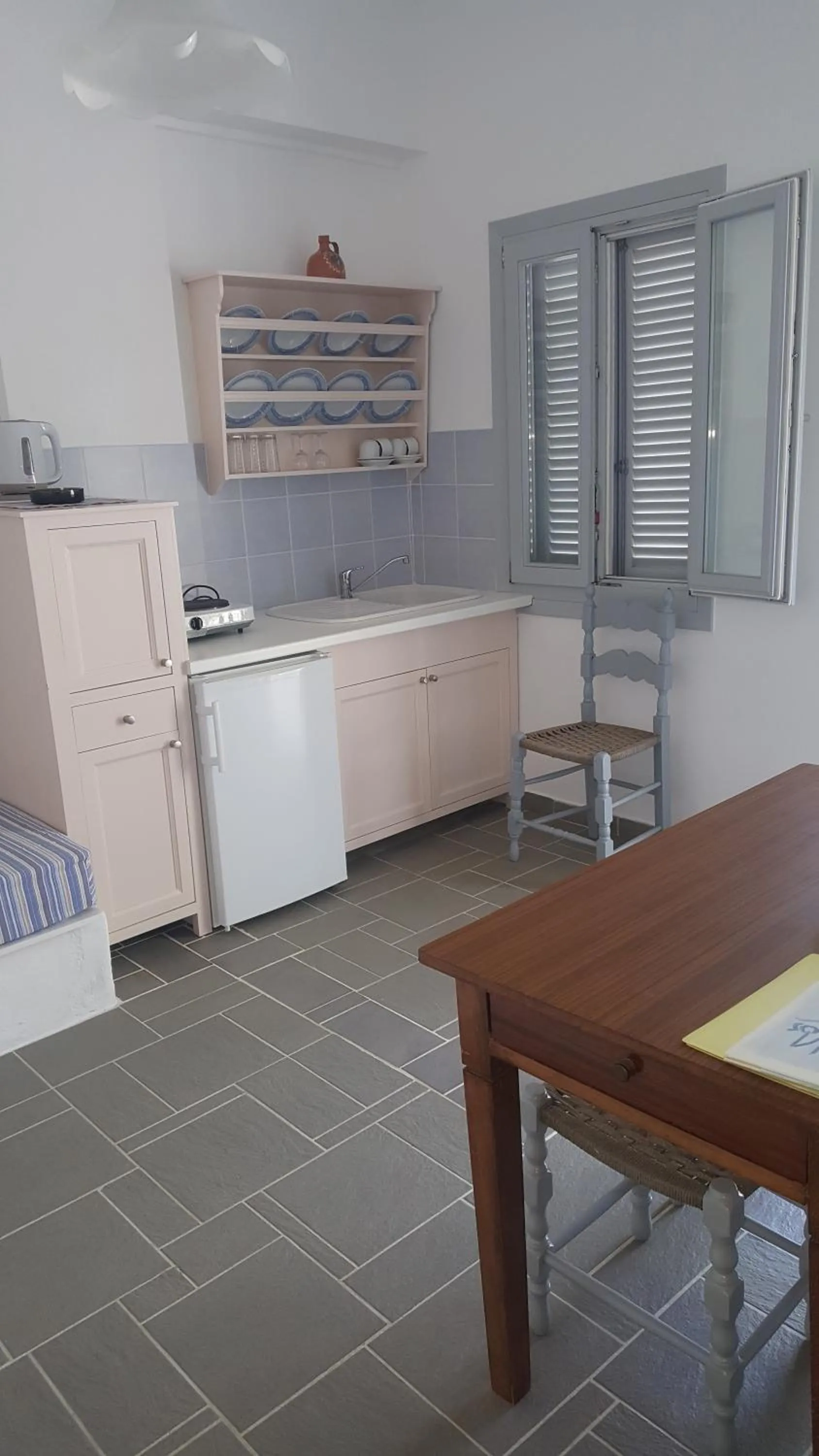 Kitchen or kitchenette in Aeolos Hotel