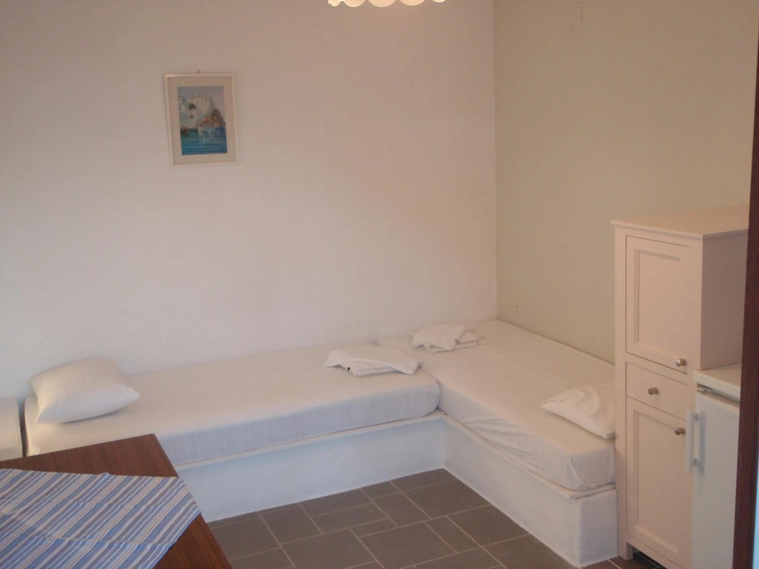 Bed in Aeolos Hotel